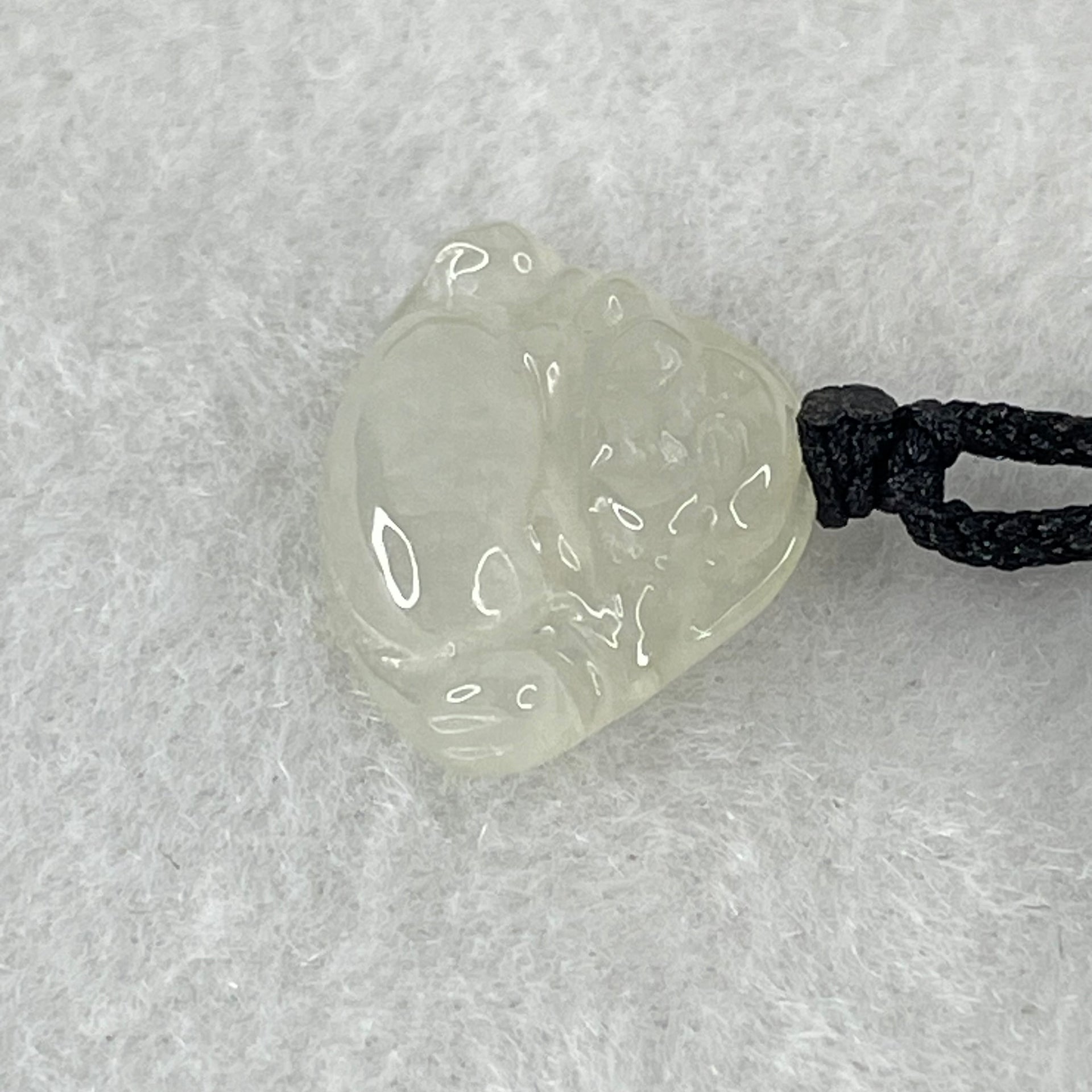 Type A Icy Faint Green Jadeite Milo Buddha Pendant 2.94g 14.6 by 18.8 by 4.9mm - Huangs Jadeite and Jewelry Pte Ltd