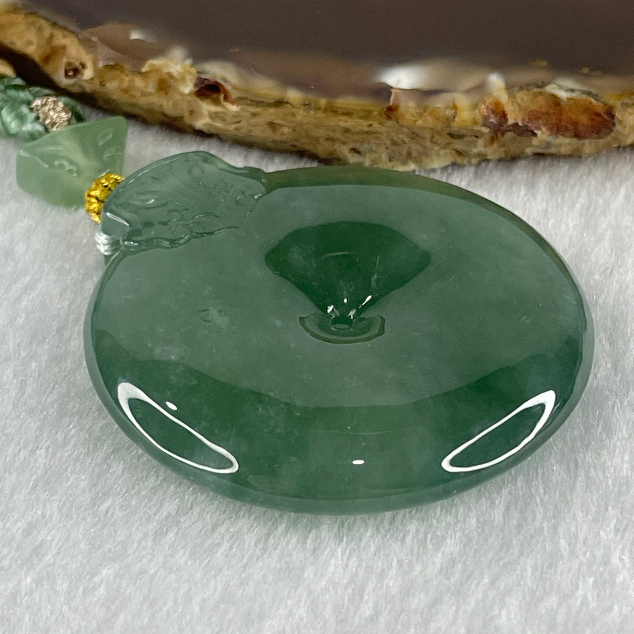 Gold Award Grand Master Type A Icy Bluesish Green Ping An Kou with Mystical Beast Jadeite Pendant 35.90g 43.8 by 8.0mm