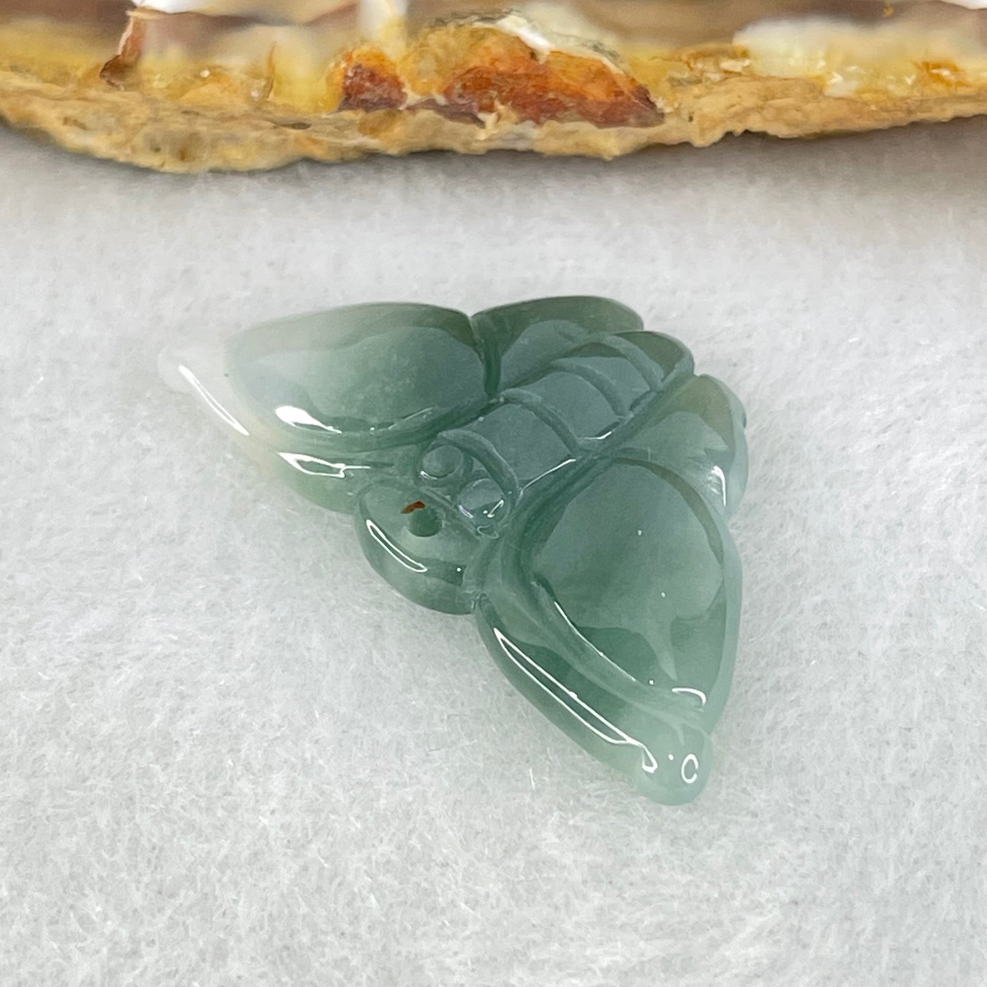 Type A Icy Blueish Green to White Jadeite Butterfly Pendant 3.27g 29.5 by 16.3 by 4.2mm - Huangs Jadeite and Jewelry Pte Ltd