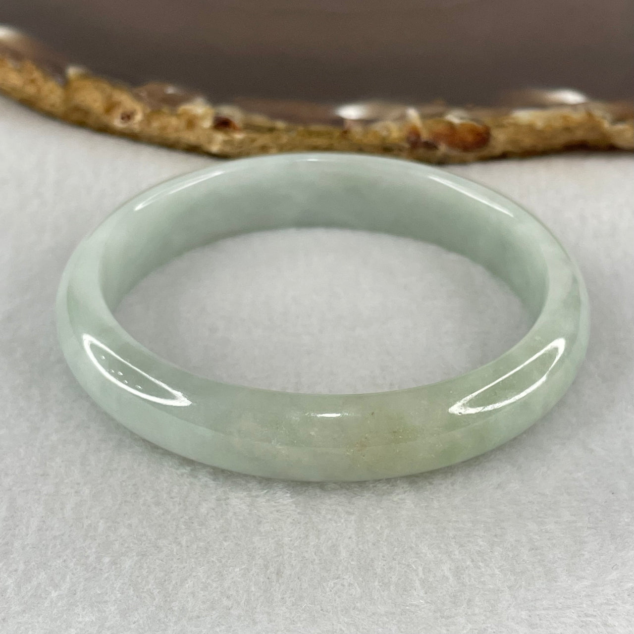 Type A Light Blueish Green Jadeite Oval Bangle 31.31g Internal Diameter 53.7mm 11.3 by 6.0mm (Internal Lines) - Huangs Jadeite and Jewelry Pte Ltd