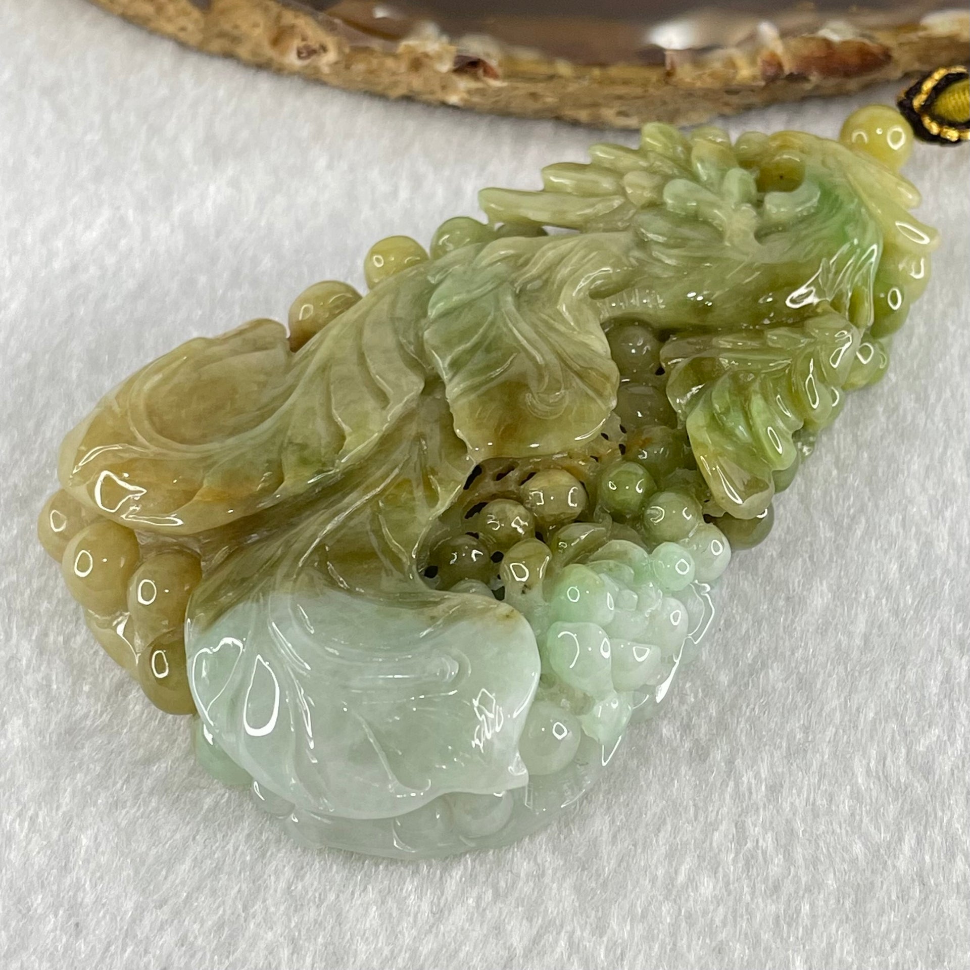 Grandmaster Type A Brownish Green and Faint Lavender Green Jadeite Double Sided Phoenix and Flower Pendant 凤戏牡丹 93.05g 79 by 50.6 by 13mm - Huangs Jadeite and Jewelry Pte Ltd