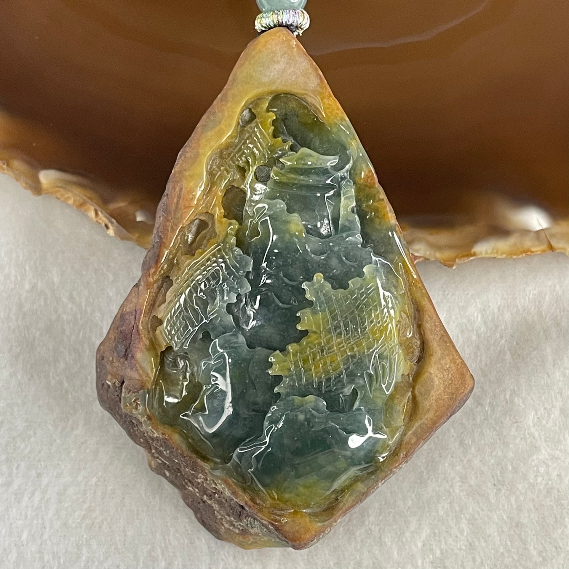 Grand Master Type A Brown with Blueish Green Jadeite Shan Shui with Guiren Benefactor Pendant 107.48g 74.0 by 53.9 by 23.3mm - Huangs Jadeite and Jewelry Pte Ltd