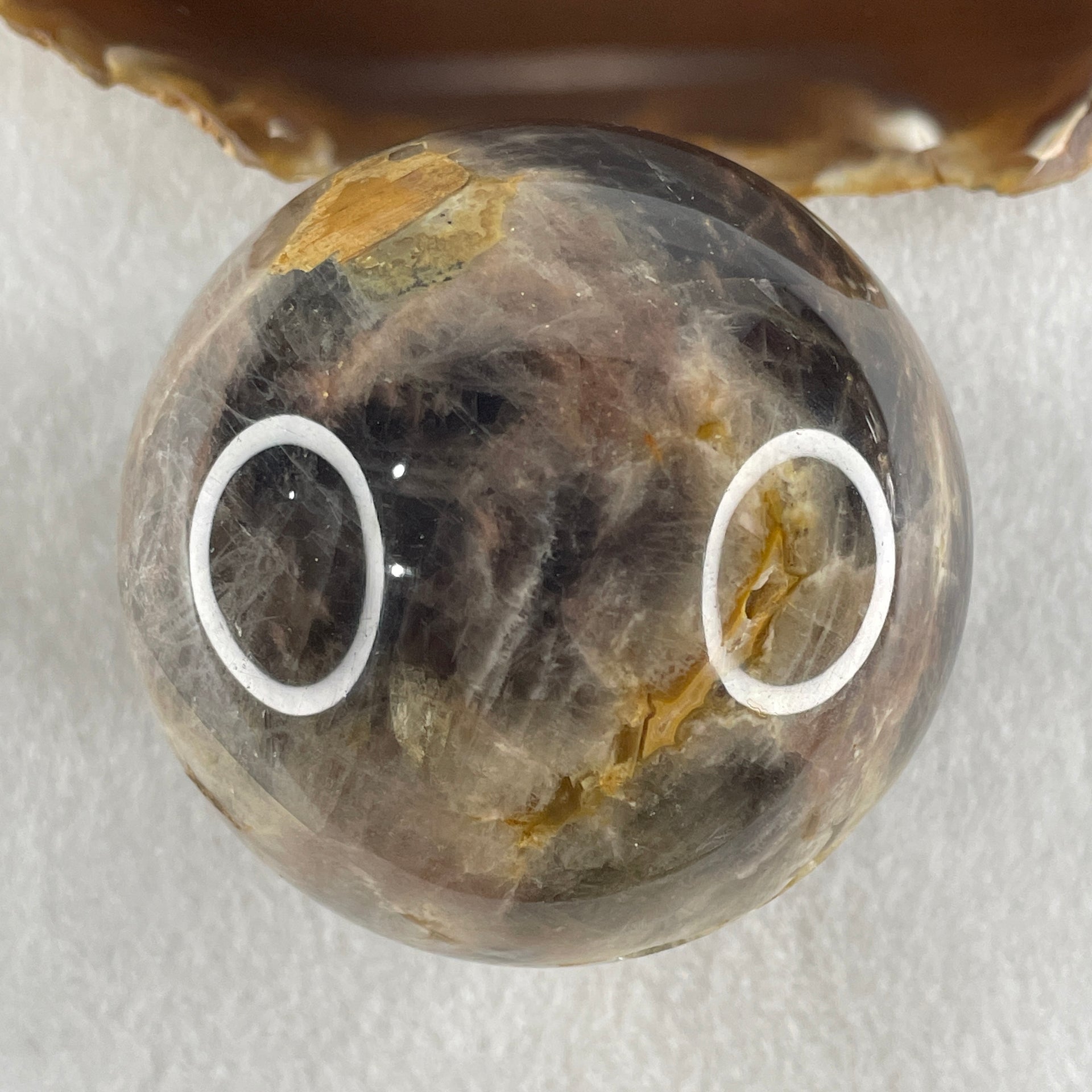 Natural Black Moonstone Ball with Clear Acrylic Display 443.95g 69.0 by 90.0mm - Huangs Jadeite and Jewelry Pte Ltd