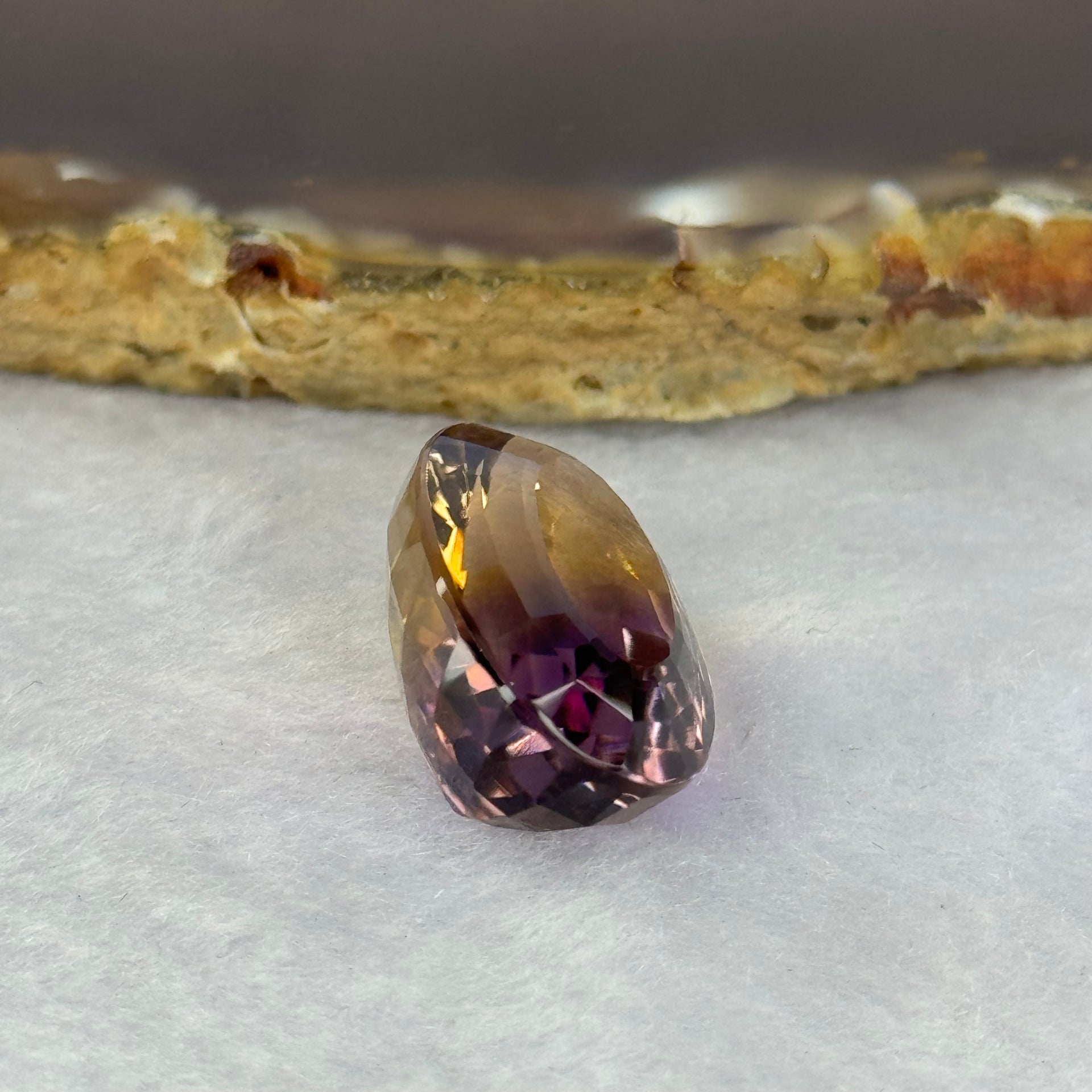 Natural Faceted Ametrine Oval Shape 24.42ct 23.2 by 15.1 by 10.9mm - Huangs Jadeite and Jewelry Pte Ltd