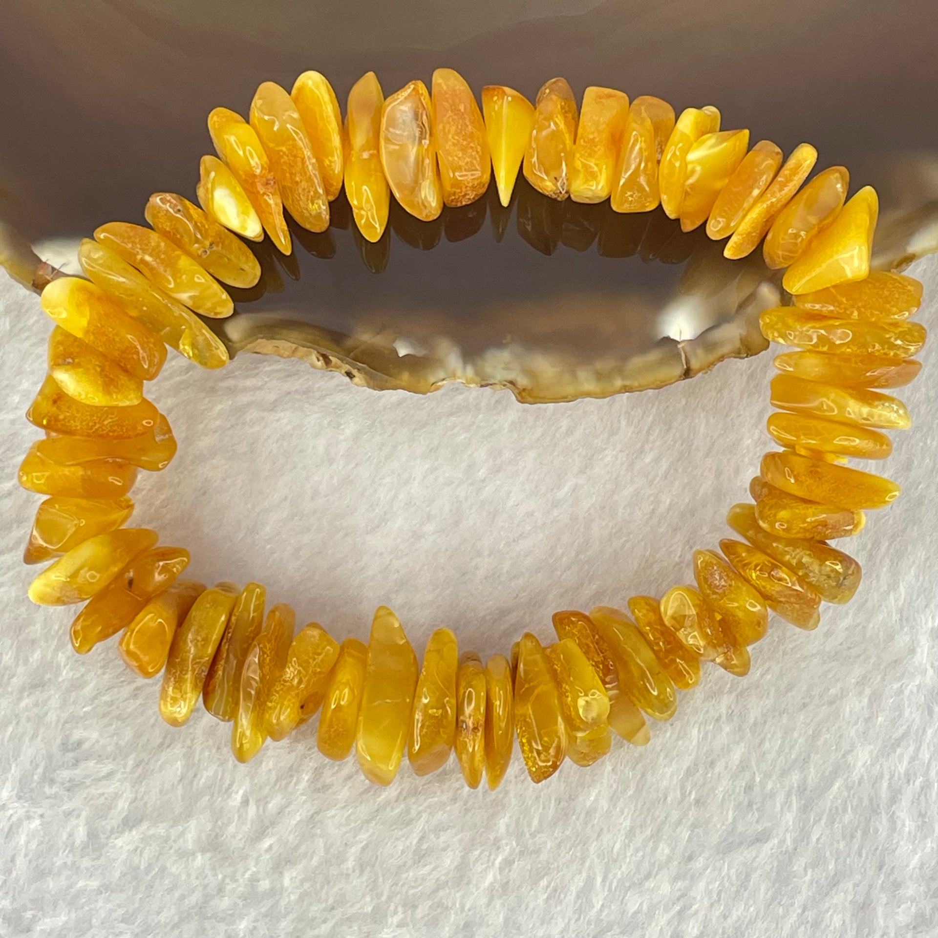 Natural Beeswax Raw Stone Irregular Beads Bracelet 天然蜜蜂蜡原石手链 17.97g 17cm 12.5 by 9.2 by 5.3mm 12.9 by 9.3 by 4.5mm 55pcs - Huangs Jadeite and Jewelry Pte Ltd