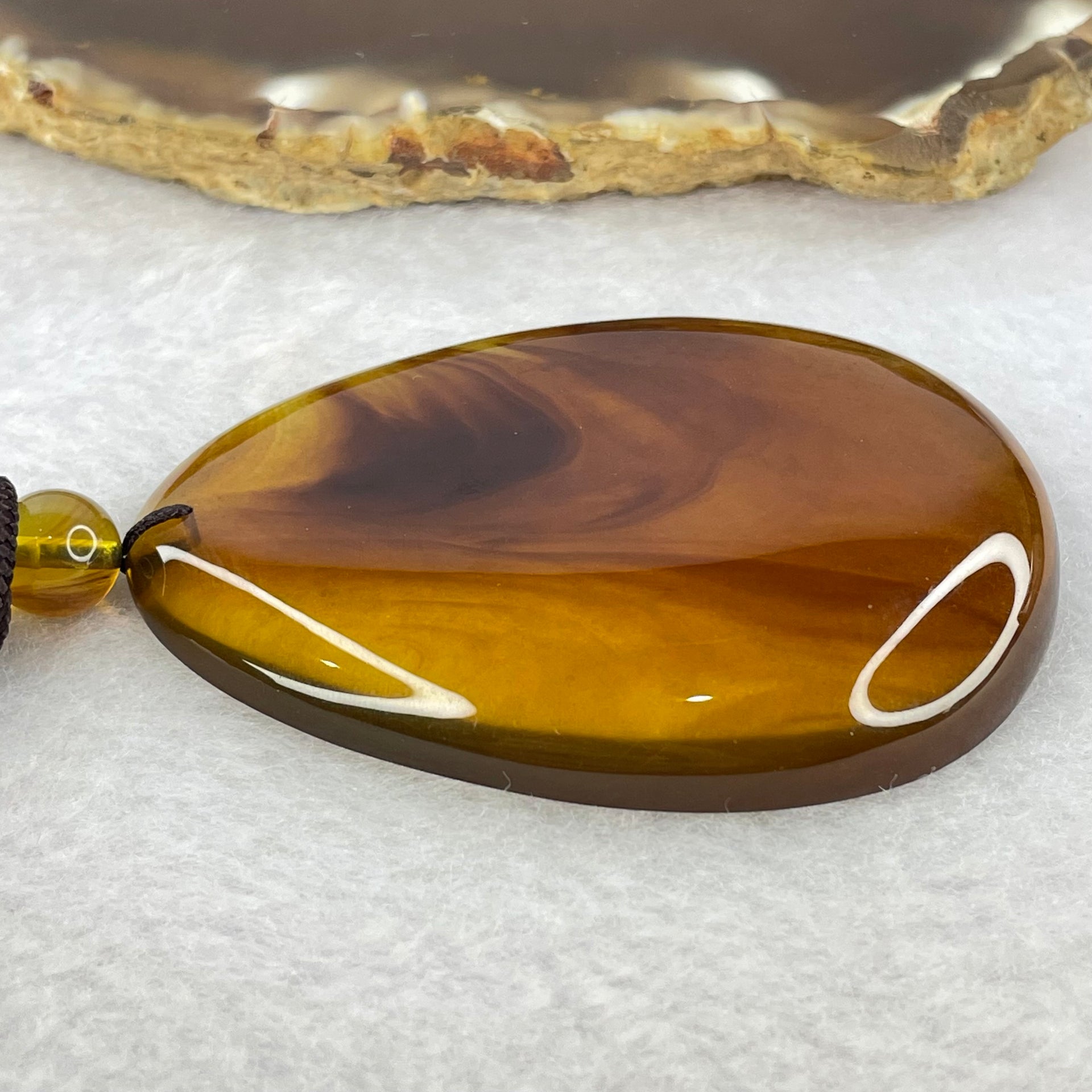 Natural Cognac with Red Amber Pendent 15.33g 65.3 by 46.3 by 14.0mm - Huangs Jadeite and Jewelry Pte Ltd