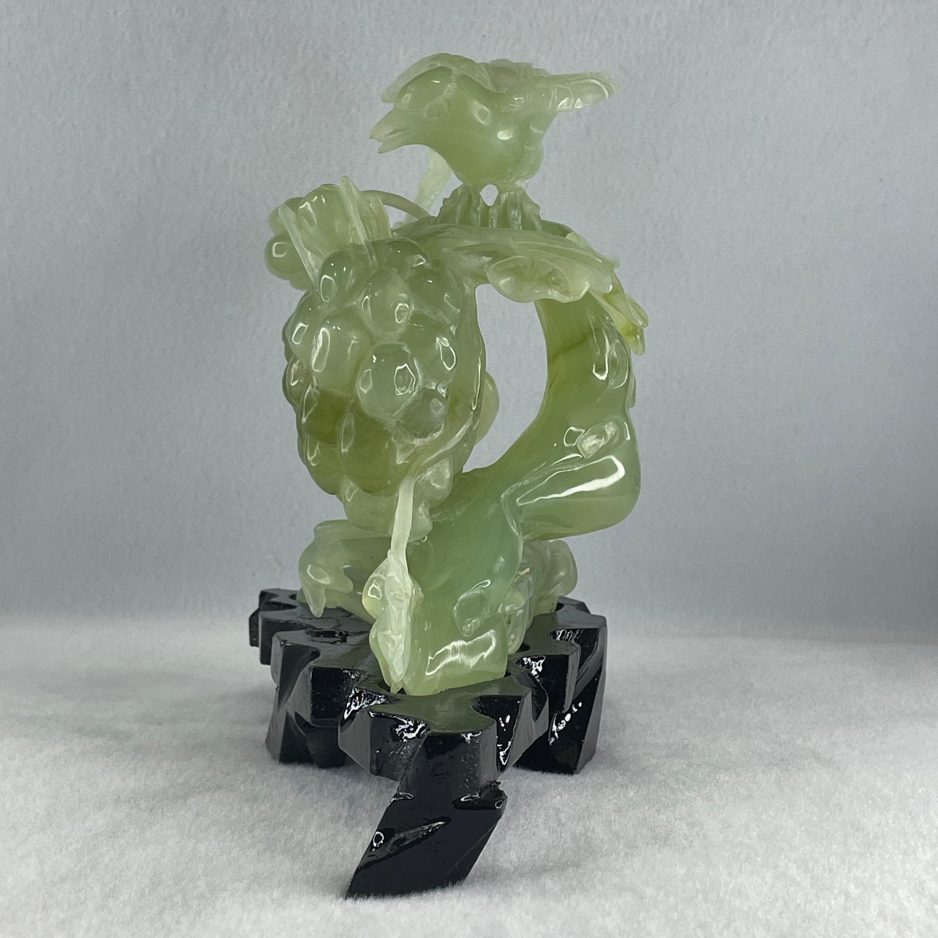 Natural Green Serpentine Magpie Bird with Cricket on Grape with Wooden Stand Display 1,042.7g L195.0 by B105.0 by H180.0 mm - Huangs Jadeite and Jewelry Pte Ltd