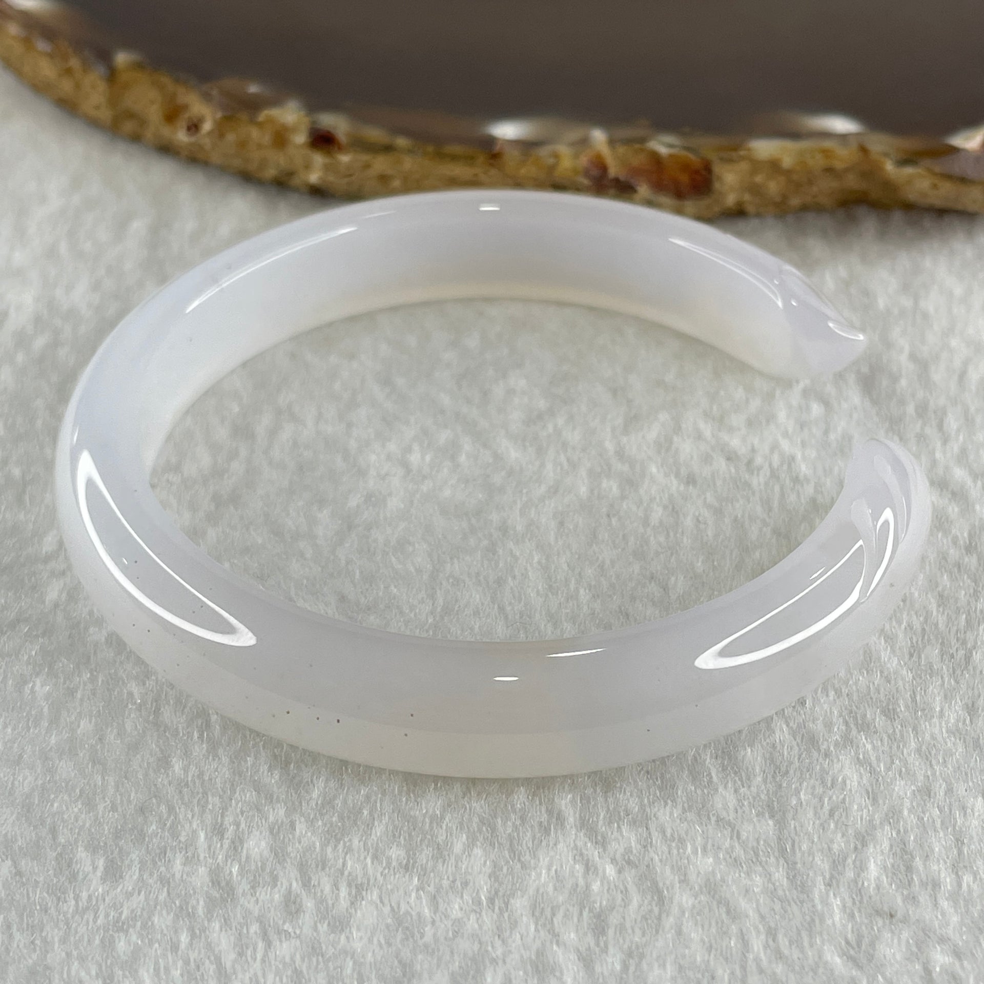 Natural Pinky Agate 9 Tail Fox Bangle 29.8g Internal Diameter 58.7mm 10.8 by 7.2mm - Huangs Jadeite and Jewelry Pte Ltd