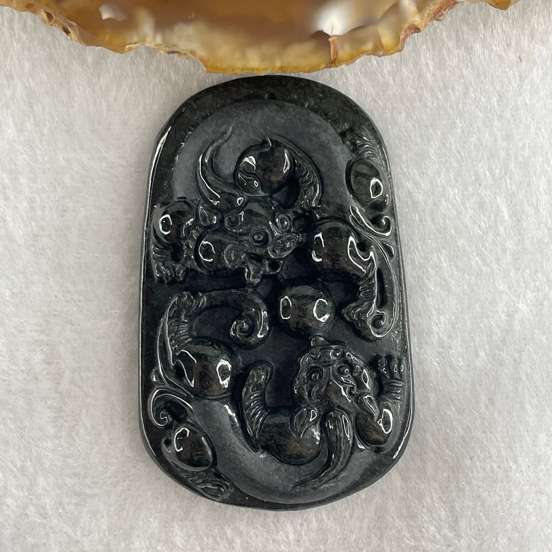 Type A Opaque to Partial Translucent Black Omphacite Jadeite Pixiu Pair Pendant 22.39g 54.7 by 34.8 by 8.8mm - Huangs Jadeite and Jewelry Pte Ltd