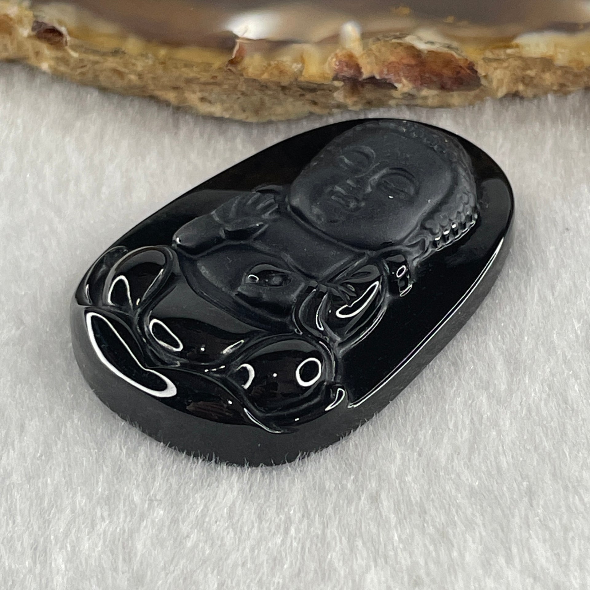 Type A Opaque to Partial Translucent Black Omphacite Jadeite Baby Buddha Pendant 13.75g 42.0 by 28.2 by 8.6mm - Huangs Jadeite and Jewelry Pte Ltd