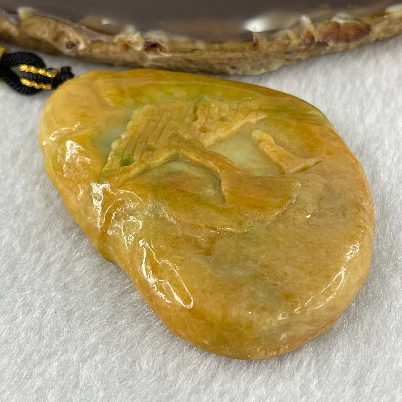 Natural Type A Yellow Jadeite Shan Shui Scenic with Gui Ren Benefactor 61.31g 66.1 by 45.1 by 11.9mm