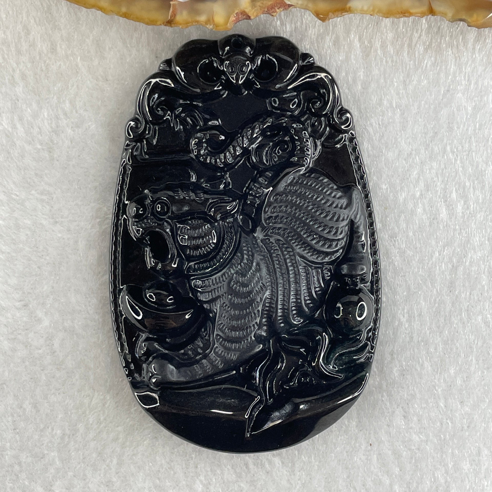 Type A Opaque to Partial Translucent Black Omphacite Jadeite Downhill Tiger Pendant 28.98g 60.9 by 39.8 by 9.0mm - Huangs Jadeite and Jewelry Pte Ltd