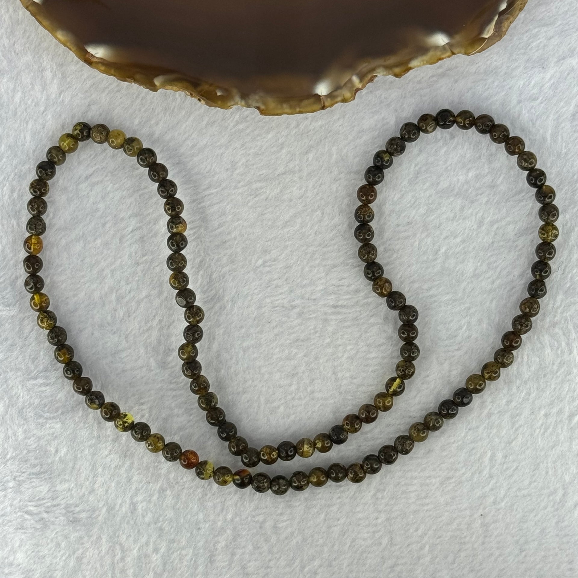 Natural Dark Brown Flower Amber Beads Elastic Necklace 8.02g 50cm 5.4mm 105 Beads - Huangs Jadeite and Jewelry Pte Ltd