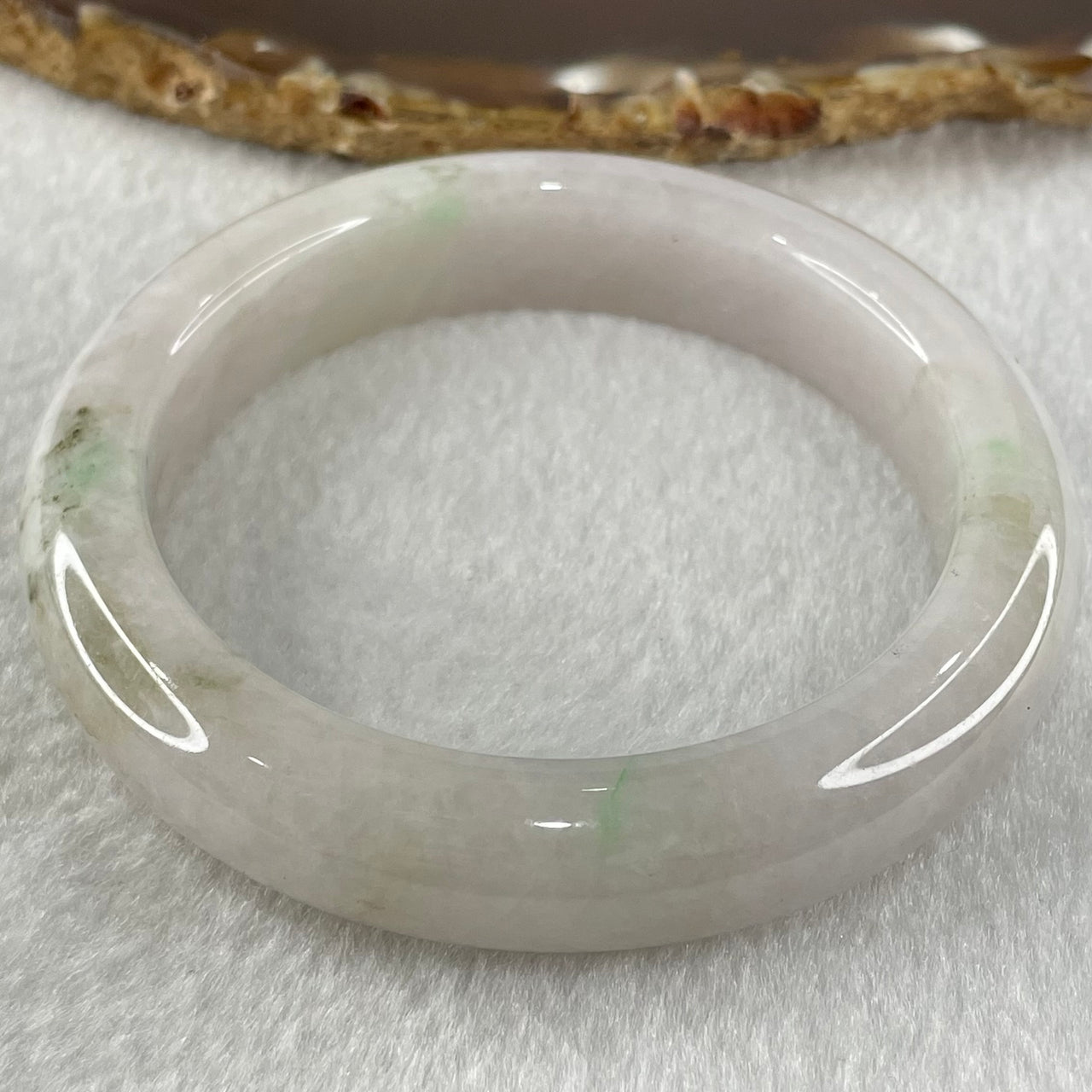 Type A Faint Lavender with Brown Patches Jadeite Bangle 66.86g Internal Diameter 56.0mm 12.7 by 9.4mm (Internal Lines) - Huangs Jadeite and Jewelry Pte Ltd