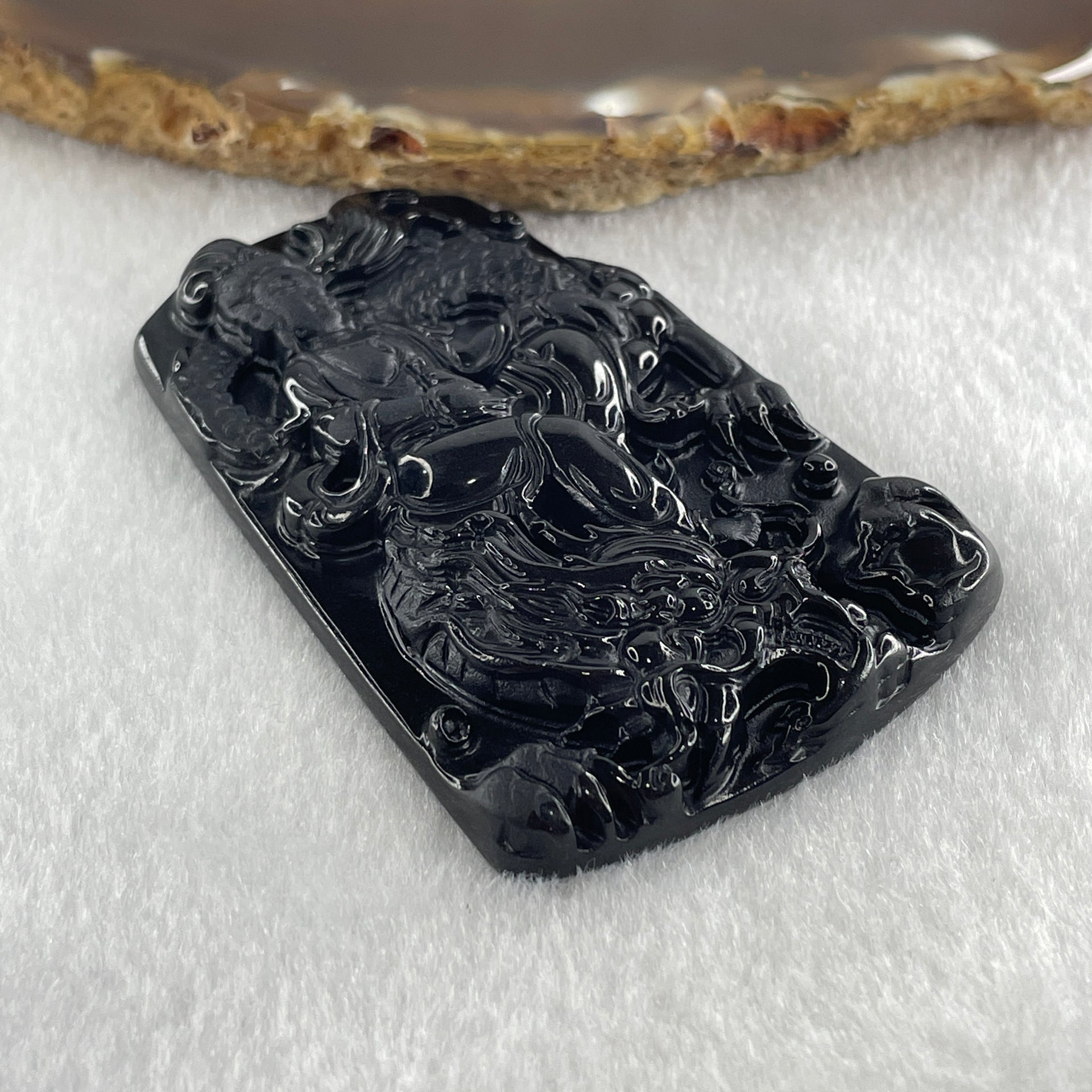 Type A Opaque Black Omphacite Jadeite Guan Yin on Dragon Pendant 36.54g 66.7 by 43.5 by 8.0mm - Huangs Jadeite and Jewelry Pte Ltd