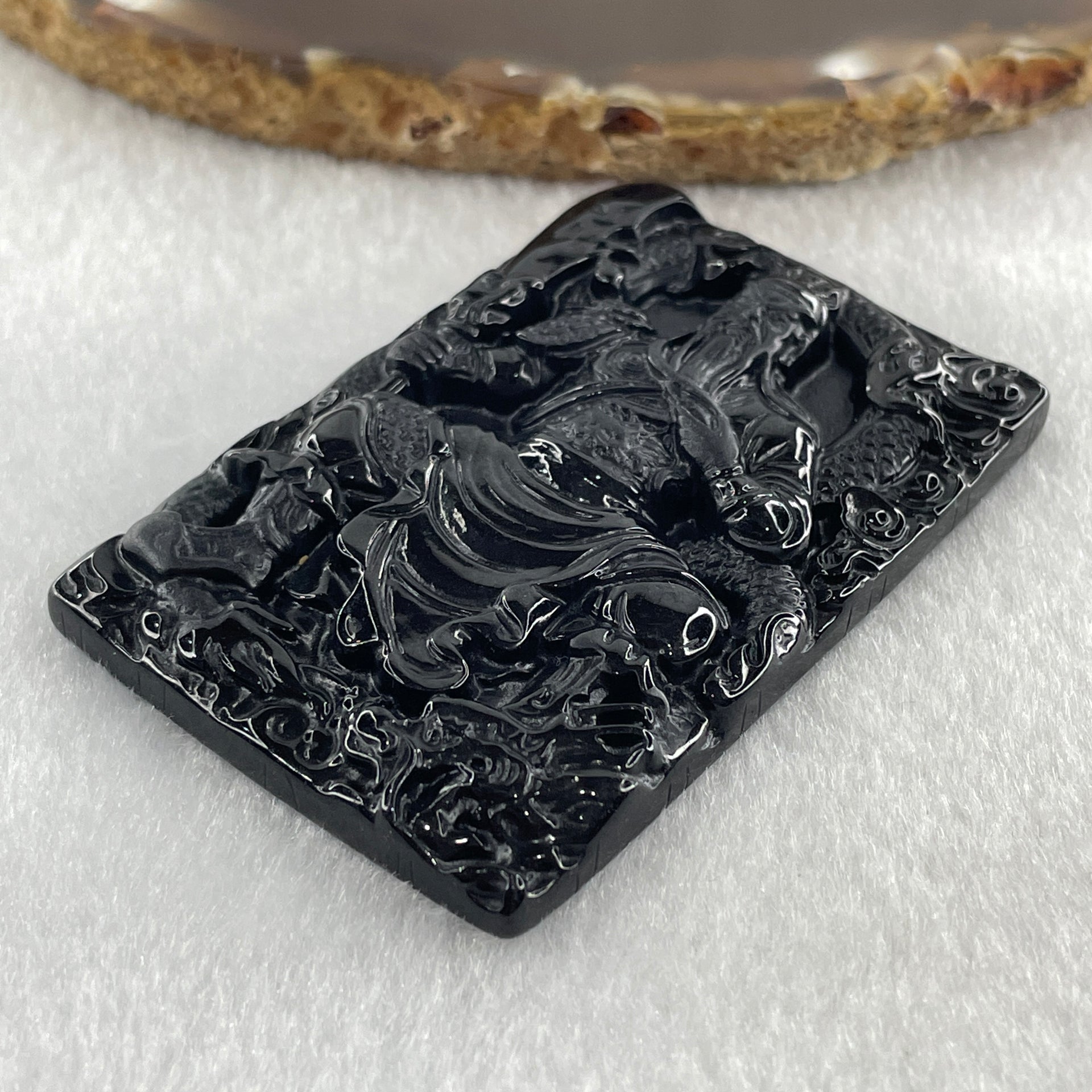Type A Opaque to Partial Translucent Black Omphacite Jadeite Guan Gong with Dragon Pendant 33.76g 61.3 by 41.6 by 7.2mm - Huangs Jadeite and Jewelry Pte Ltd