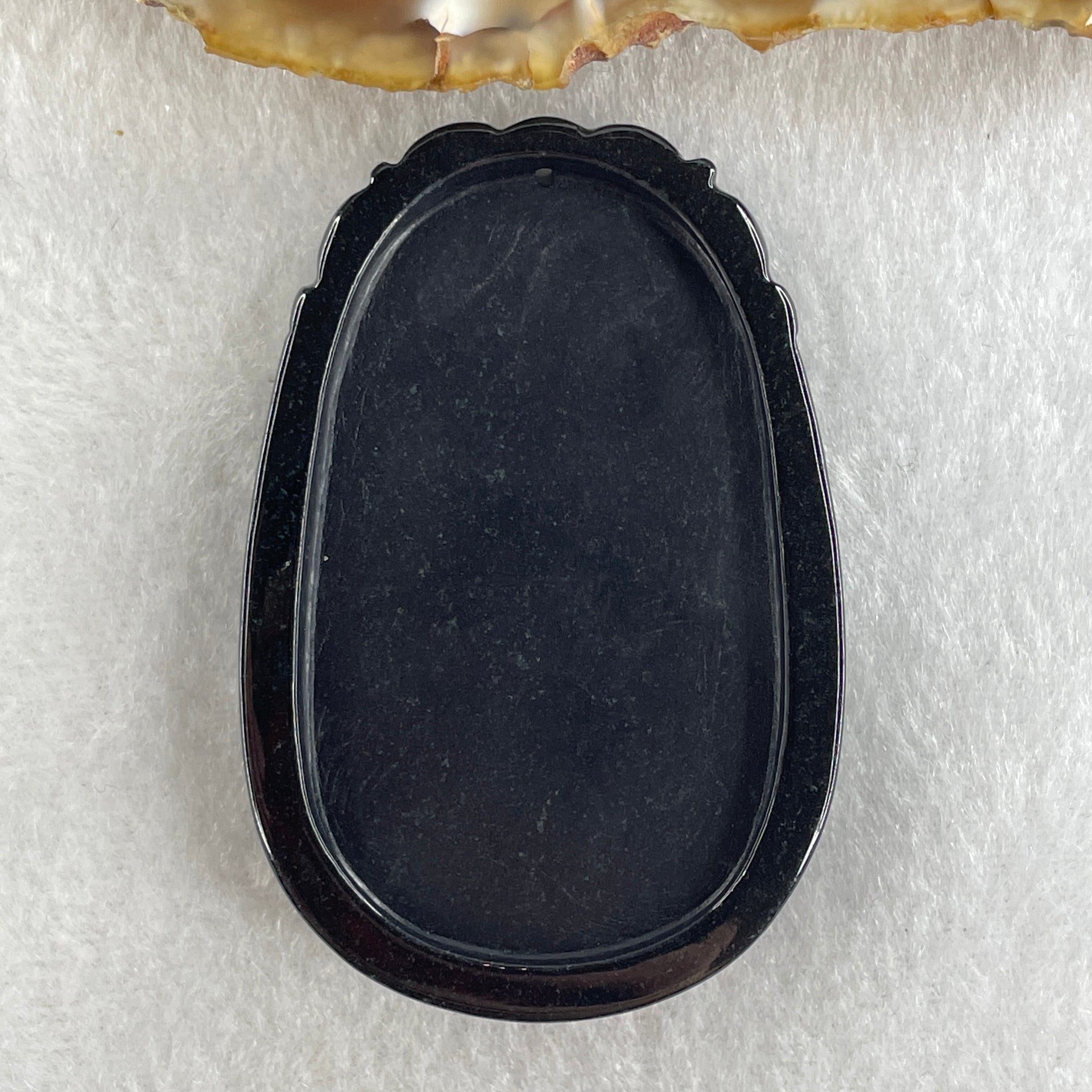 Type A Opaque to Partial Translucent Black Omphacite Jadeite Goat Pendant 27.85g 59.9 by 40.6 by 9.8mm - Huangs Jadeite and Jewelry Pte Ltd