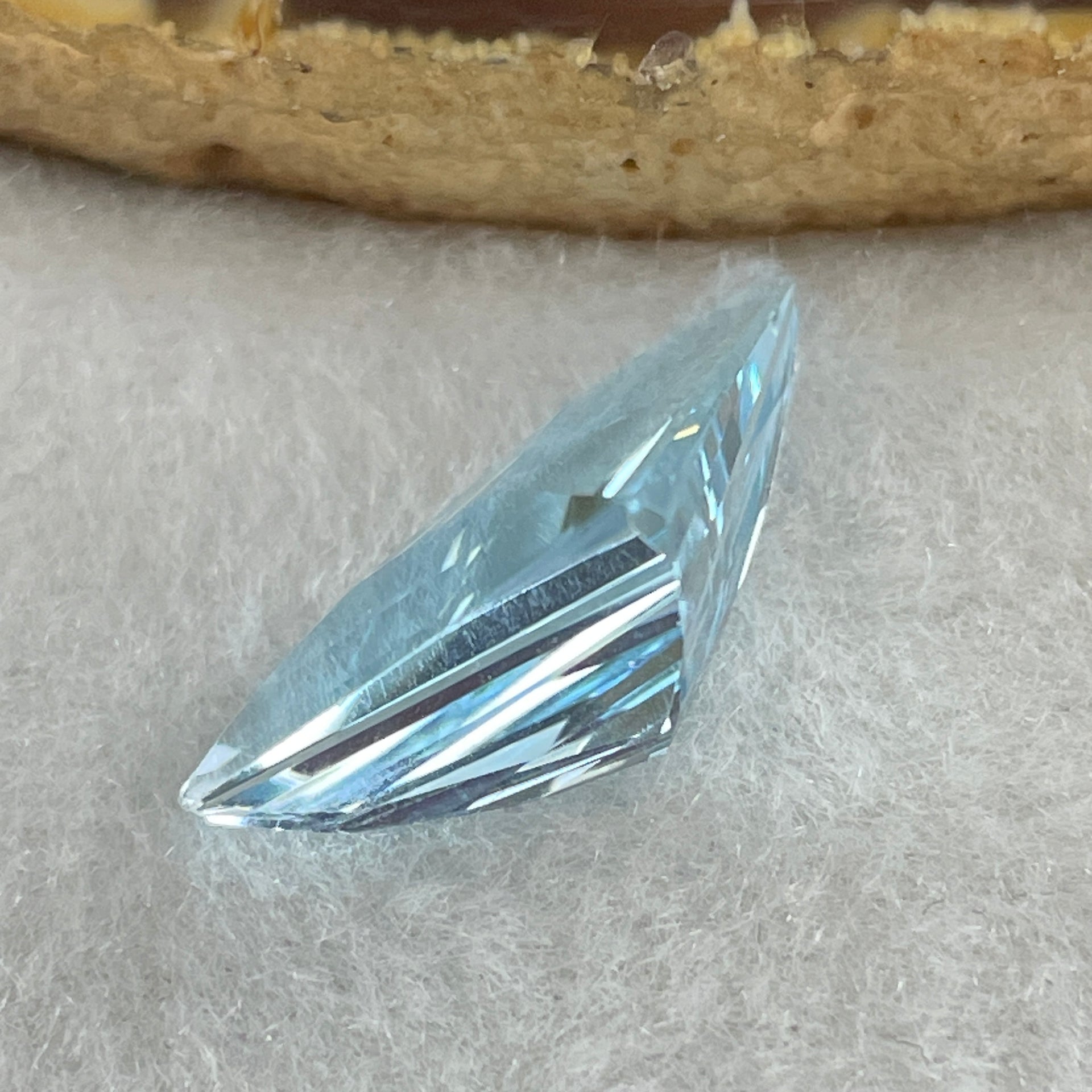 Natural Sky Blue Topaz Trillion Shape 10.32ct 21.3 by 12.4 by 7.9mm - Huangs Jadeite and Jewelry Pte Ltd
