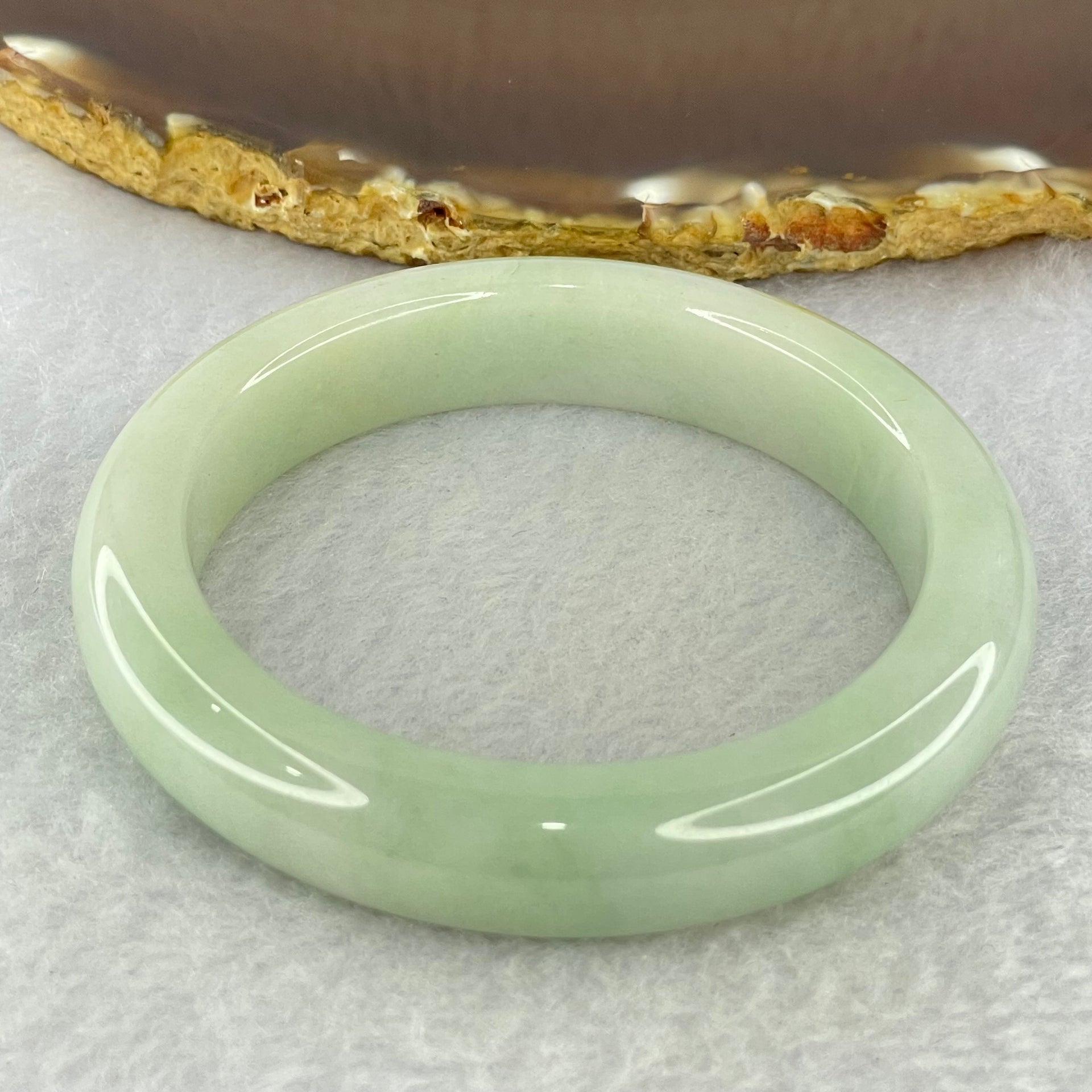 Type A Light Green Jadeite Bangle Internal Diameter 55.5mm 62.19g 12.8 by 8.9mm (External Rough) - Huangs Jadeite and Jewelry Pte Ltd