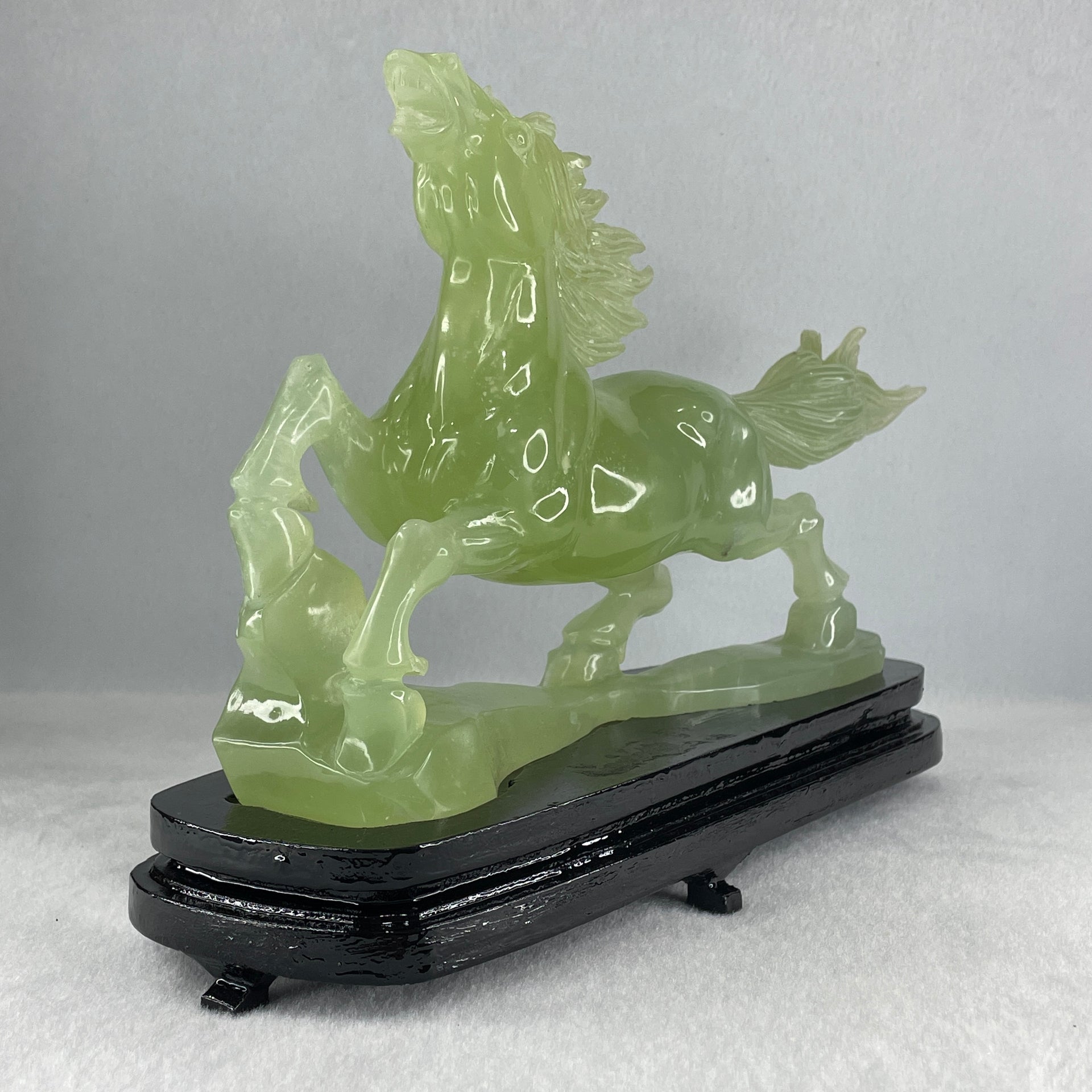 Natural Light Green Serpentine Victory Horse with Wooden Stand Display 1,274.6g 255.0 by 90.0 by 183.0mm - Huangs Jadeite and Jewelry Pte Ltd