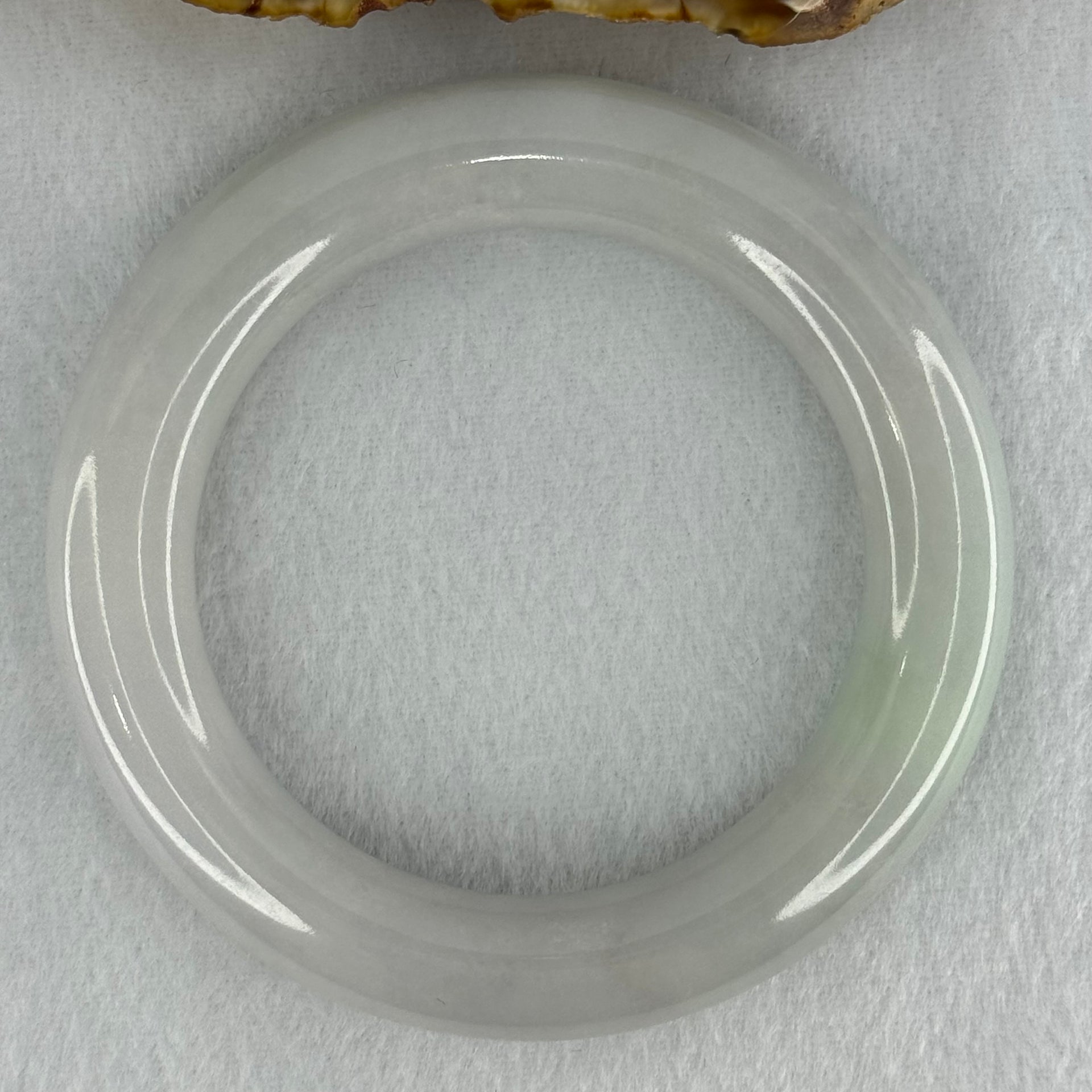 Type A Translucent Faint Blueish Green with Faint Lavender Jadeite Bangle Internal Diameter 56.79mm 437.29cts 87.85g 12.0 by 13.0mm With NGI Cert 32886087 (Close to Perfect) - Huangs Jadeite and Jewelry Pte Ltd