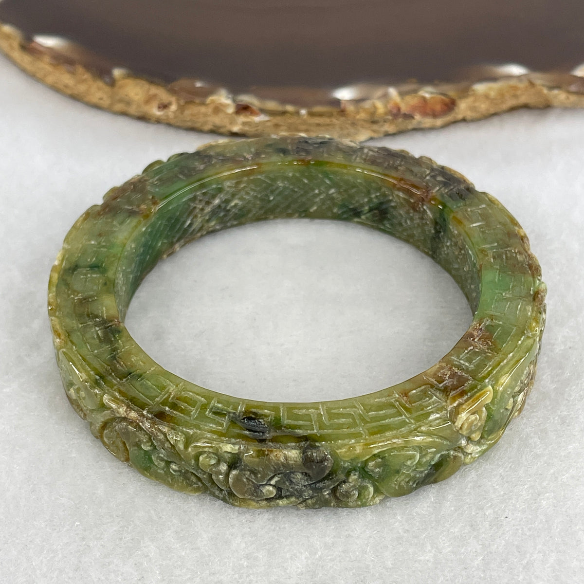 Natural Green with Brown Serpentine Prosperity Flowers & Ruyi Carved Bangle | 53.5mm Inner Diameter (71.90g | 12.2×10.0mm | Heart & Root Chakra Balance, Abundance & Wish-Fulfilling Protection)(External Rough)