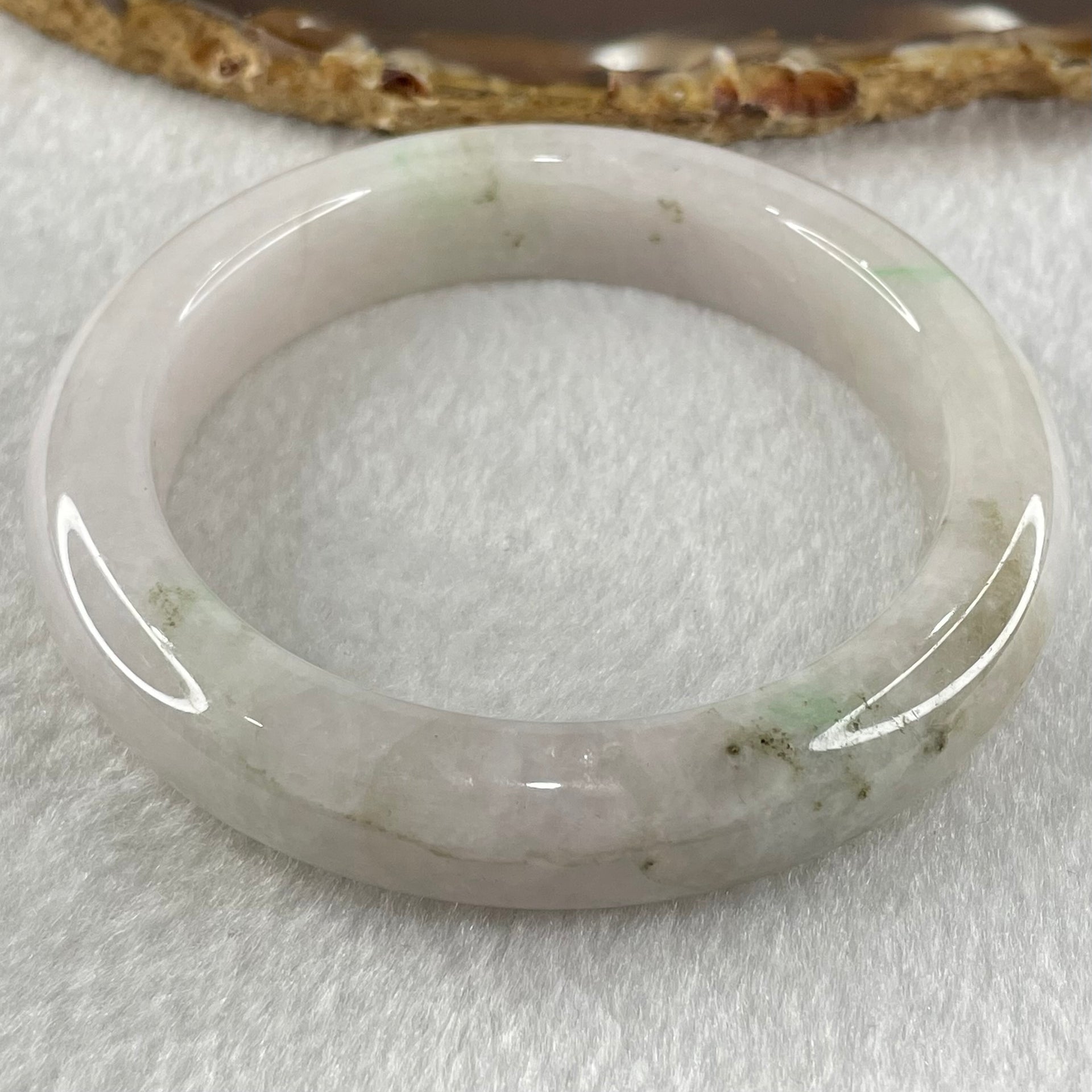 Type A Faint Lavender with Brown Patches Jadeite Bangle 66.86g Internal Diameter 56.0mm 12.7 by 9.4mm (Internal Lines) - Huangs Jadeite and Jewelry Pte Ltd