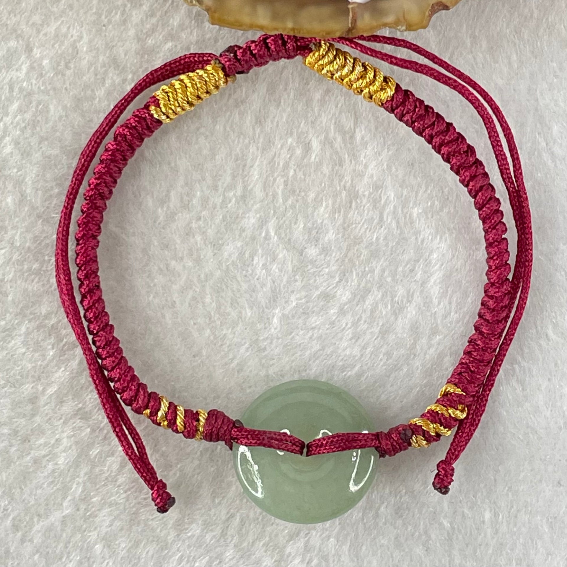 Type A Blueish Green Jadeite Ping An Kou Donut In String Bracelet 2.38g 16.4 by 4.6mm - Huangs Jadeite and Jewelry Pte Ltd