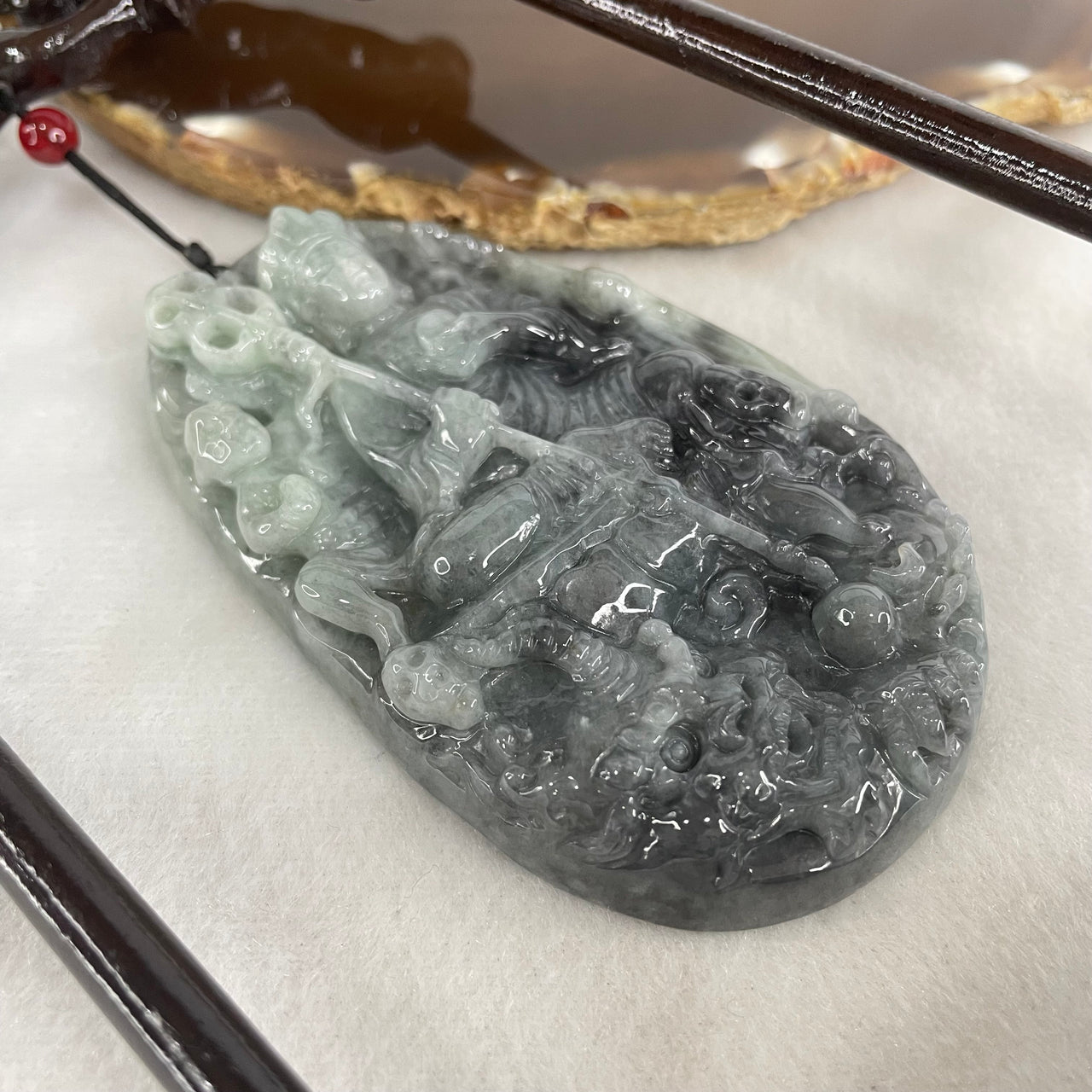 Type A Green With Wuji Grey Piao Hua Jadeite Ksitigarbha Bodhisattva, 地藏王菩萨, the Bodhisattva of Great Aspiration Display 178.8g 111.7 by 51.8 by 200.0mm - Huangs Jadeite and Jewelry Pte Ltd