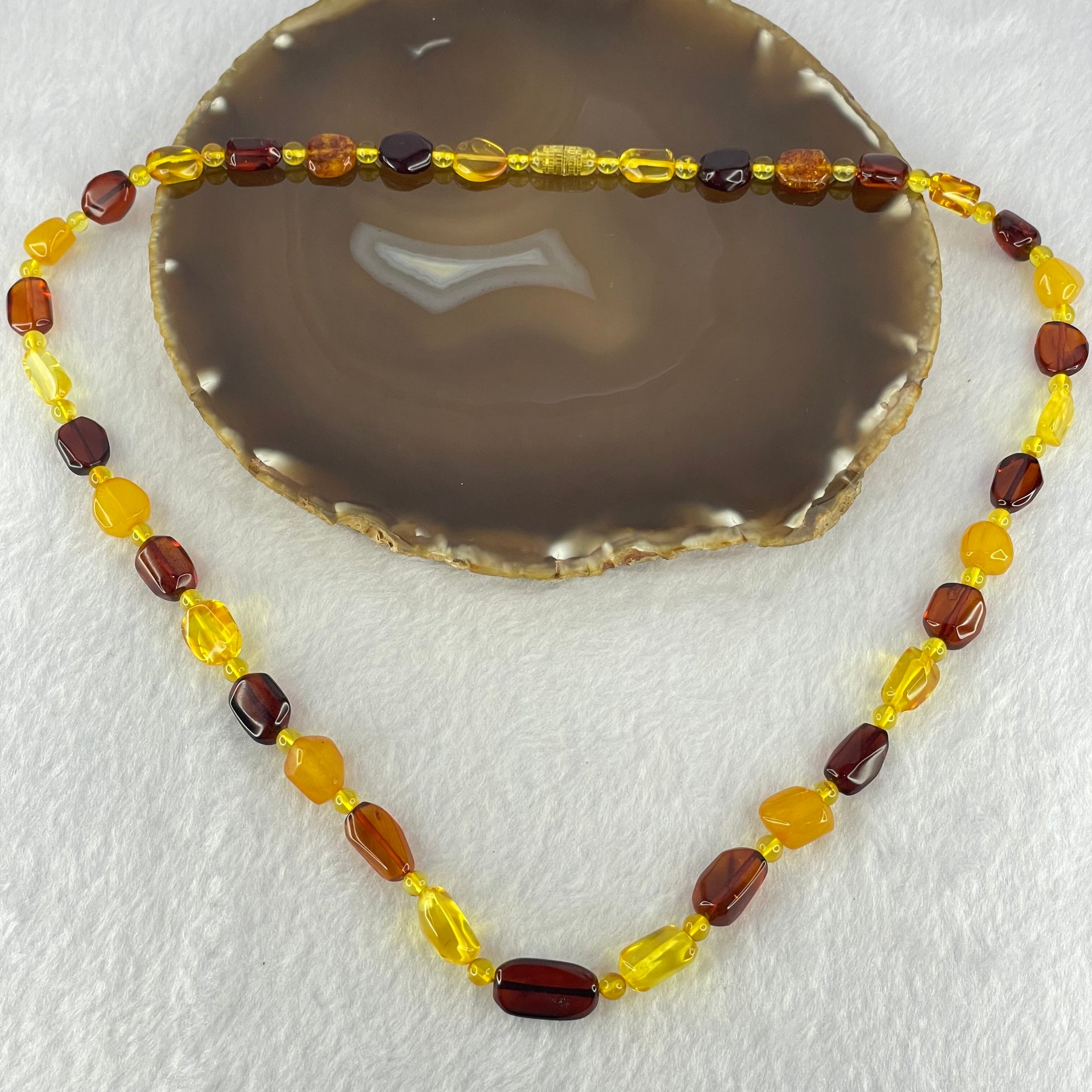 Natural Mixed Color Amber Beads Necklaces 18.16g 60cm 18.8 by 10.2 by 4.8mm, 11.2 by 7.1 by 5.5mm 35pcs - Huangs Jadeite and Jewelry Pte Ltd