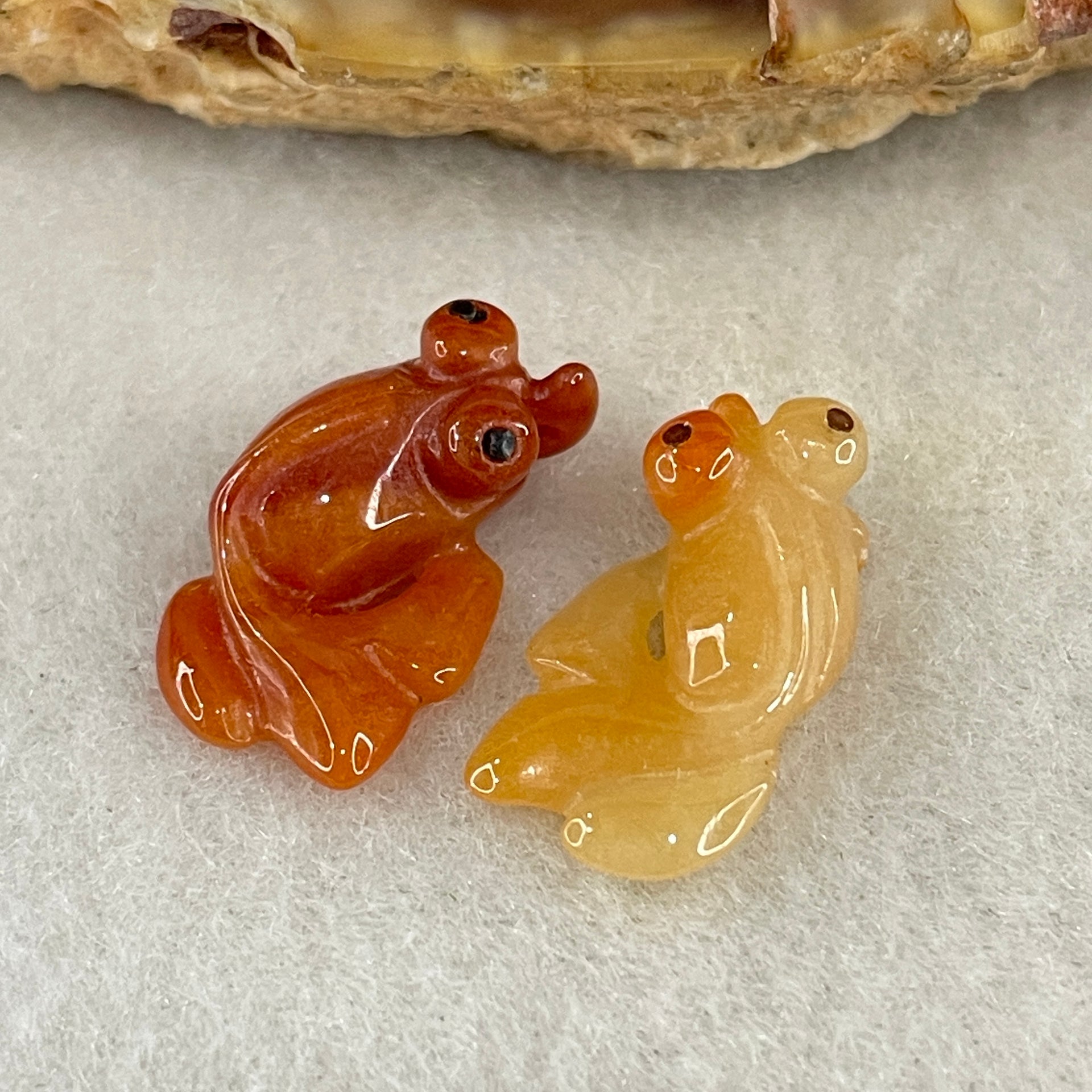 Natural Type A Yellow and Red Jadeite Pair Gold Fish Charm each 0.97g 16.9 by 9.4 by 5.5mm and 1.21g 17.0 by 9.8 by 5.7mm - Huangs Jadeite and Jewelry Pte Ltd