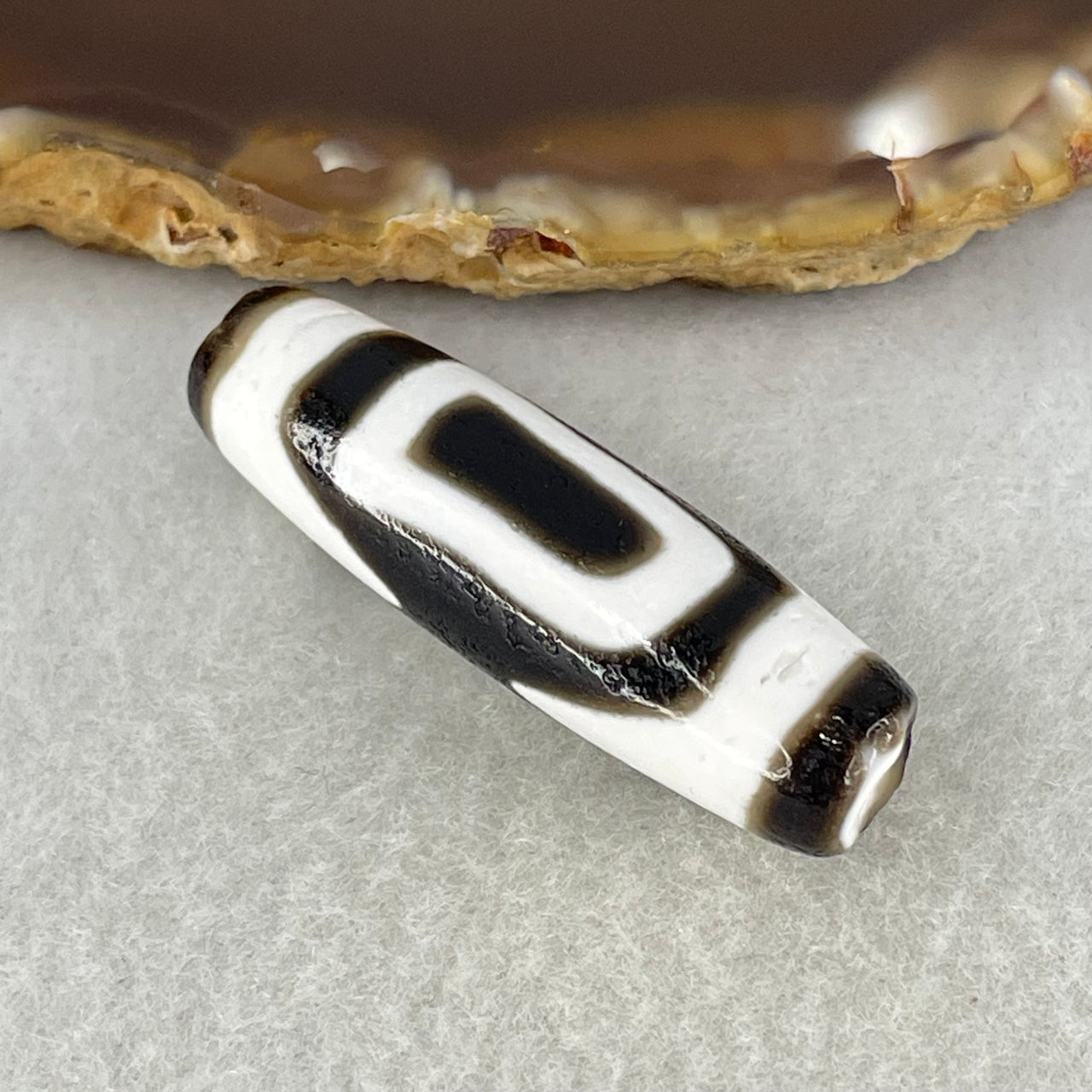 Natural Powerful Tibetan Old Oily Agate 2 Eyed Bead Heavenly Master (Tian Zhu) 7.94g 39.3 by 11.6mm - Huangs Jadeite and Jewelry Pte Ltd