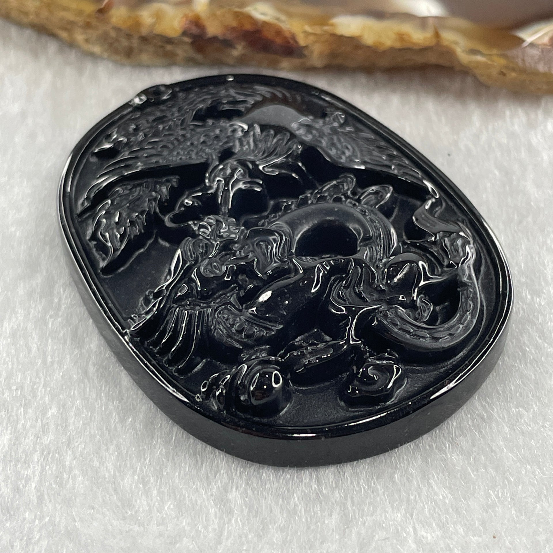 Type A Opaque to Partial Translucent Black Omphacite Jadeite Dragon and Phoenix Pendant 20.96g 50.2 by 38.3 by 8.4mm - Huangs Jadeite and Jewelry Pte Ltd