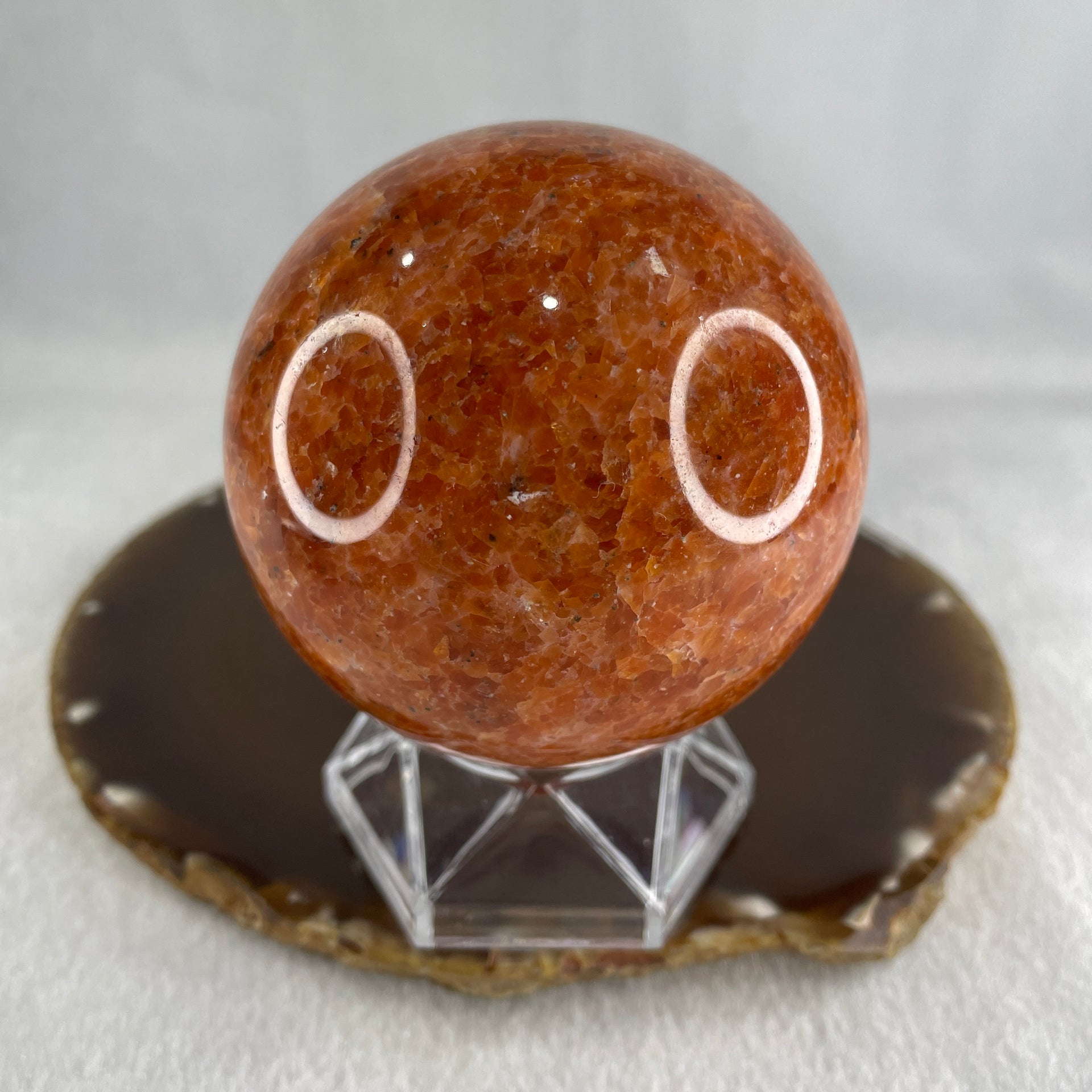 Natural Orange Calcite Ball with Clear Acrylic Display 545.43g 72.0 by 91.0mm - Huangs Jadeite and Jewelry Pte Ltd