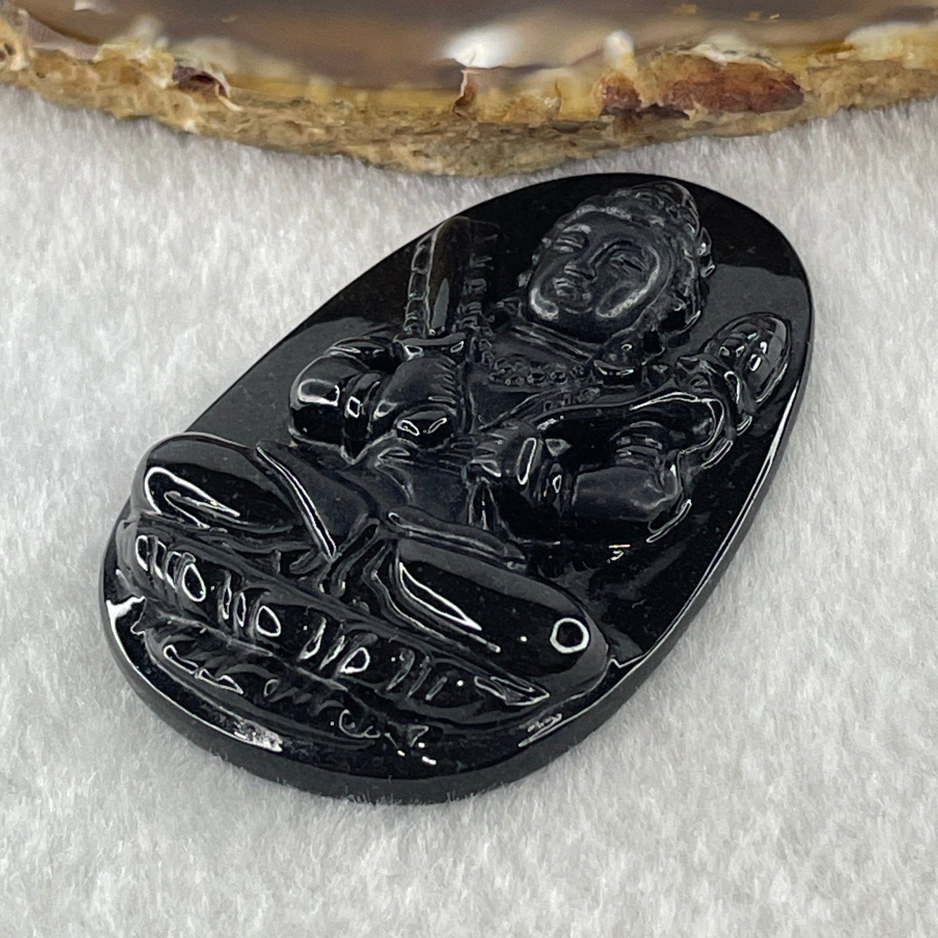 Type A Opaque to Partial Translucent Black Omphacite Jadeite Akasagarbha Bodhissattva Pendant Ox and Tiger Zodiac Guardian 17.04g 52.7 by 34.2 by 7.4mm - Huangs Jadeite and Jewelry Pte Ltd