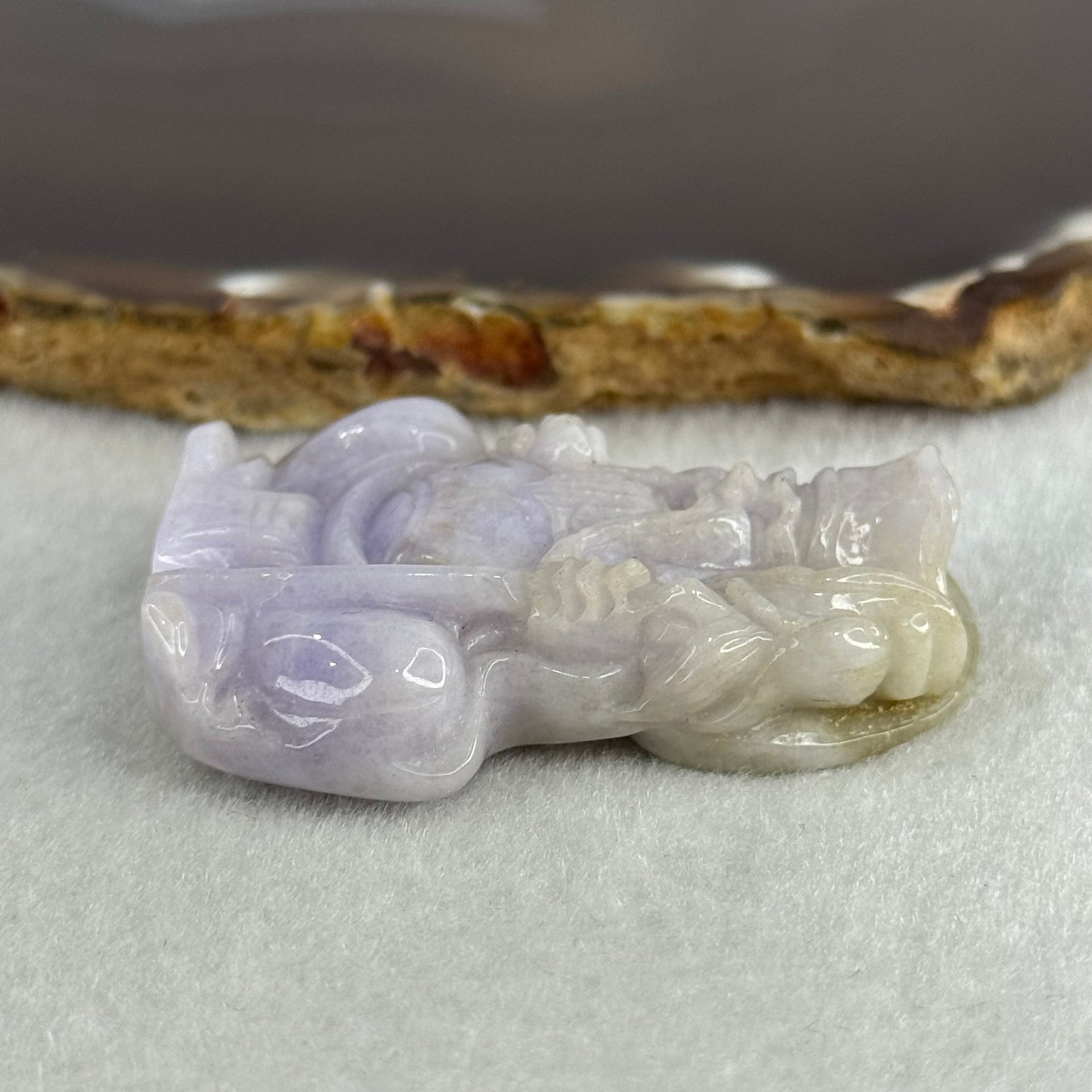 Type A Lavender with Slight Green Jadeite Tu Di Gong 38.27g 48.0 by 39.3 by 11.9mm - Huangs Jadeite and Jewelry Pte Ltd