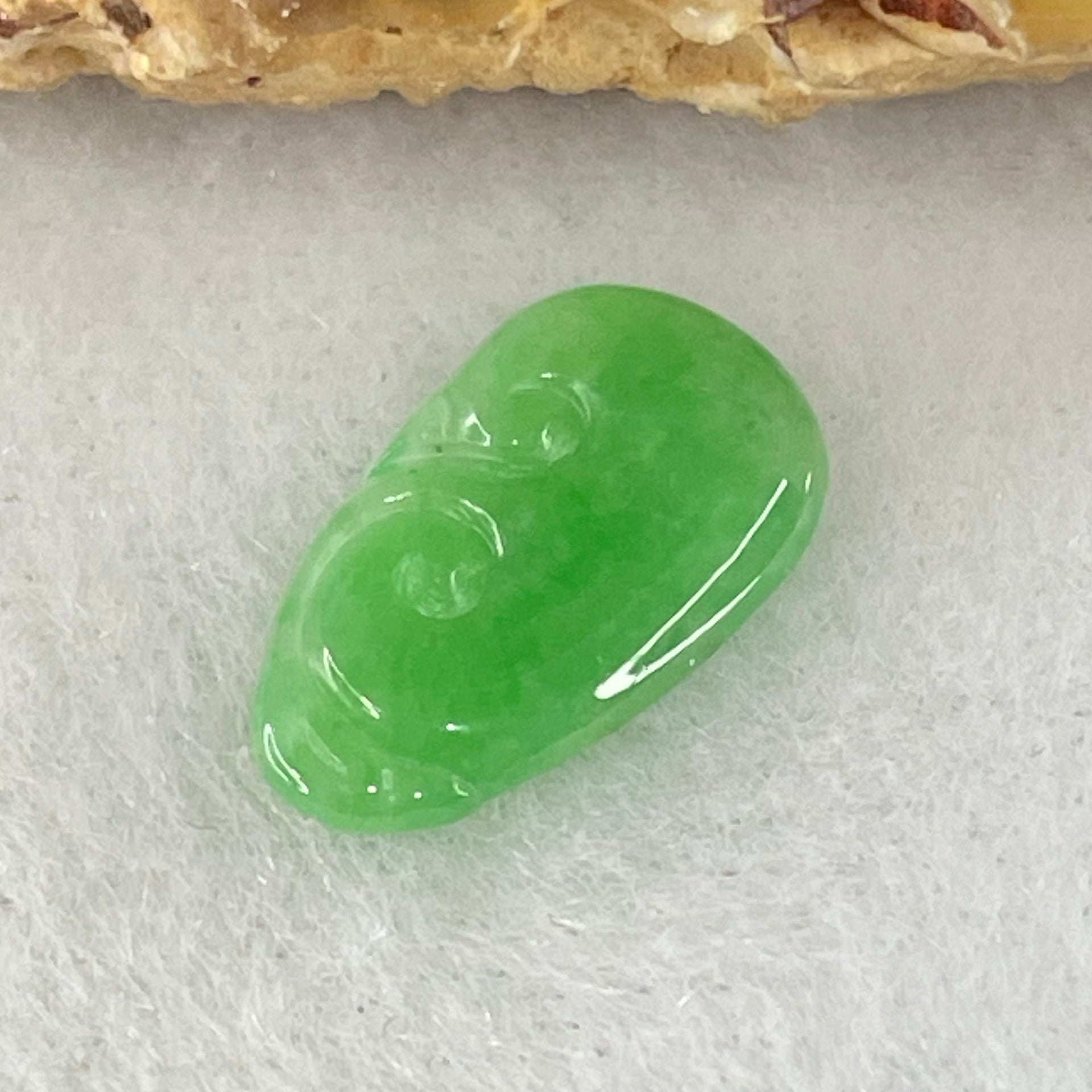 Type A Old Mine Spicy Green Jadeite Ruyi Charm Stone For Setting 0.36g 14.1 by 8.3mm by 1.4mm - Huangs Jadeite and Jewelry Pte Ltd