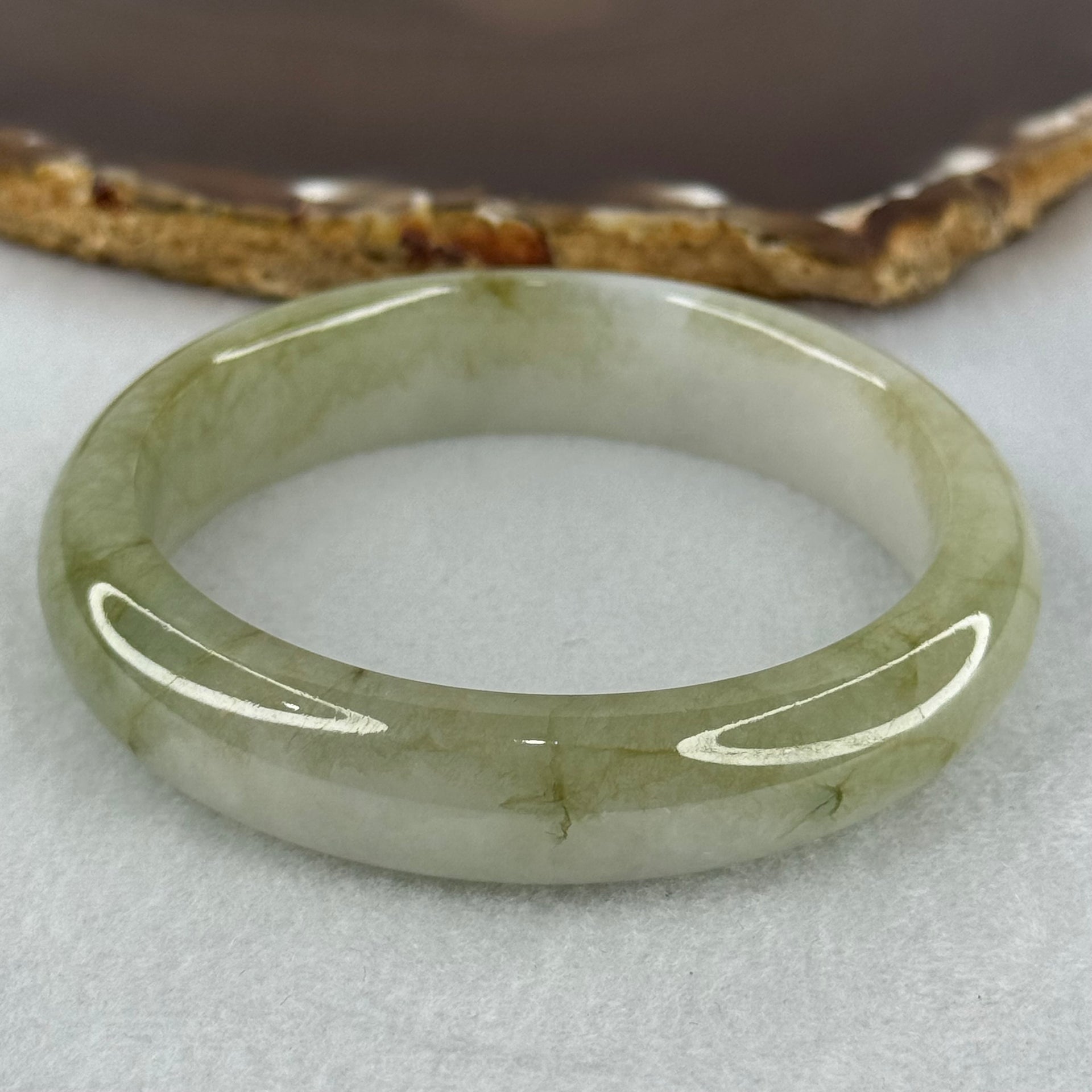 Type A Green Patches with Faint Pinkish Lavender Jadeite Bangle Internal Diameter 56.6mm 59.85g 14.1 by 8.4mm (External Lines) - Huangs Jadeite and Jewelry Pte Ltd