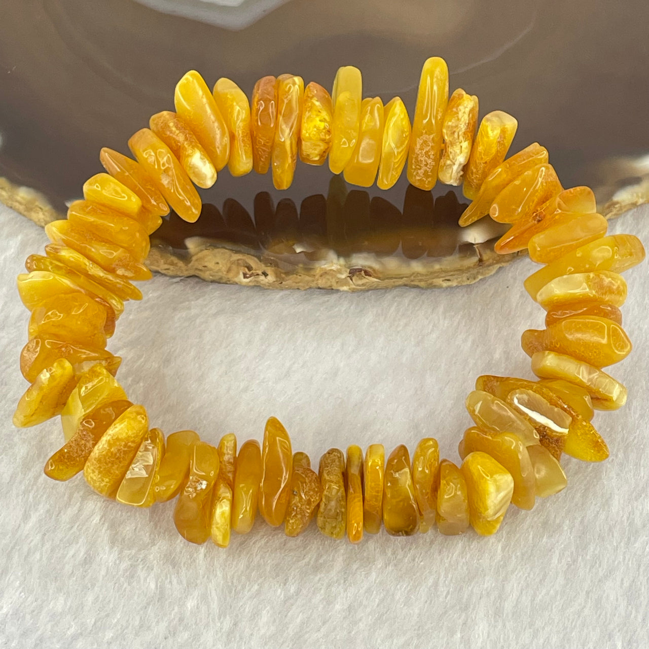 Natural Beeswax Raw Stone Irregular Beads Bracelet 天然蜜蜂蜡原石手链 22.59g 18.5cm 21.6 by 12.6 by 4.7mm, 13.1 by 11.7 by 4.8mm 54pcs - Huangs Jadeite and Jewelry Pte Ltd