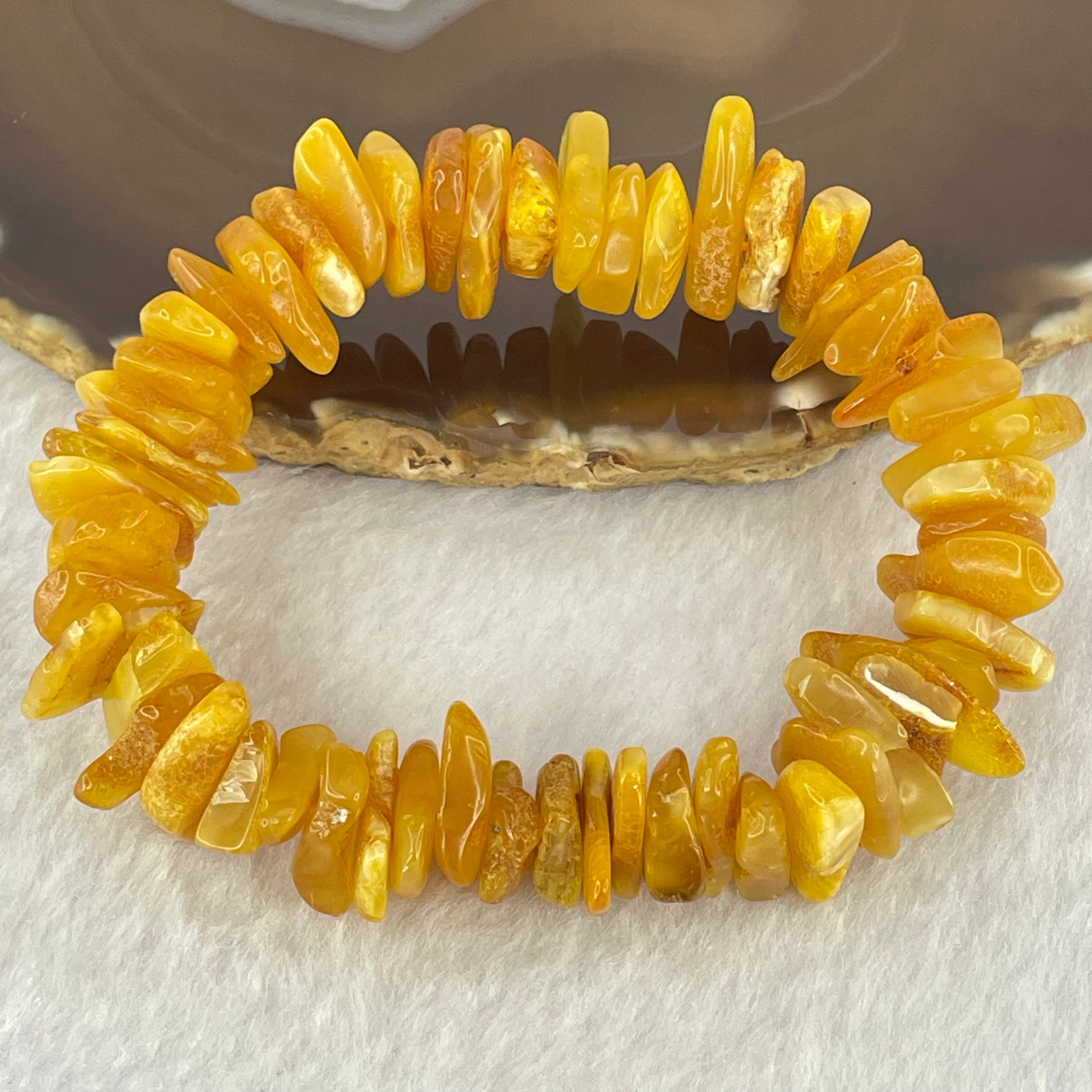Natural Beeswax Raw Stone Irregular Beads Bracelet 天然蜜蜂蜡原石手链 22.59g 18.5cm 21.6 by 12.6 by 4.7mm, 13.1 by 11.7 by 4.8mm 54pcs - Huangs Jadeite and Jewelry Pte Ltd