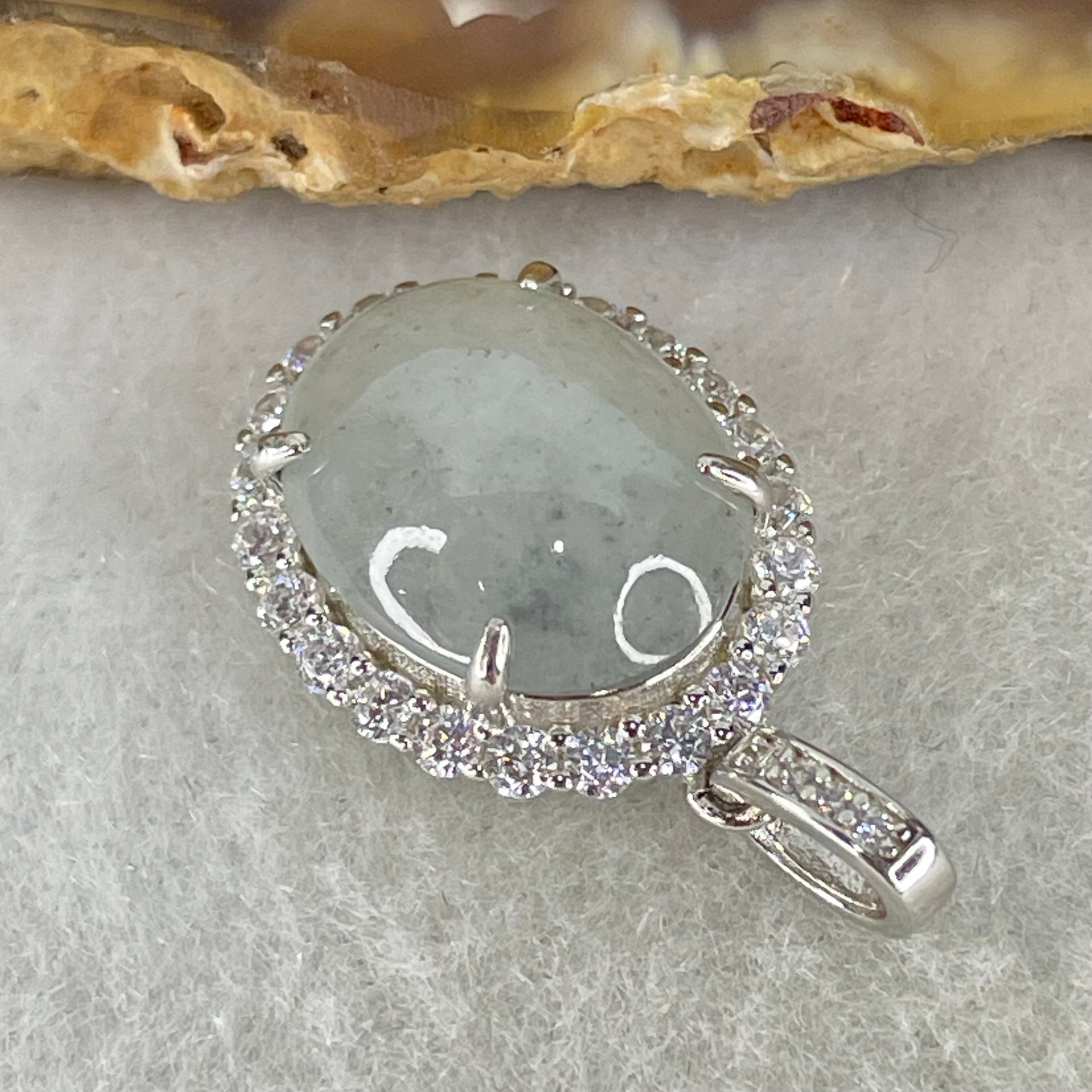 Type A Icy Green With Wuji Grey Spots Cabochon Jadeite in S925 Sliver Crystal Charm 2.85g 13.9 by 10.9 by 5.0mm - Huangs Jadeite and Jewelry Pte Ltd