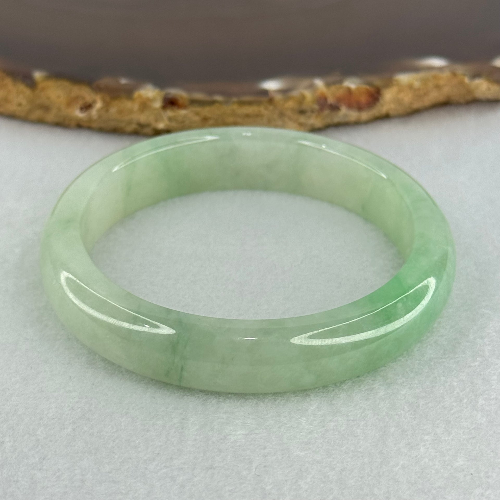 Type A Semi Icy Bright Green Jadeite Oval Bangle Internal Diameter 54.4mm 40.37g 11.3 by 8.4mm (Slight Internal Lines) - Huangs Jadeite and Jewelry Pte Ltd