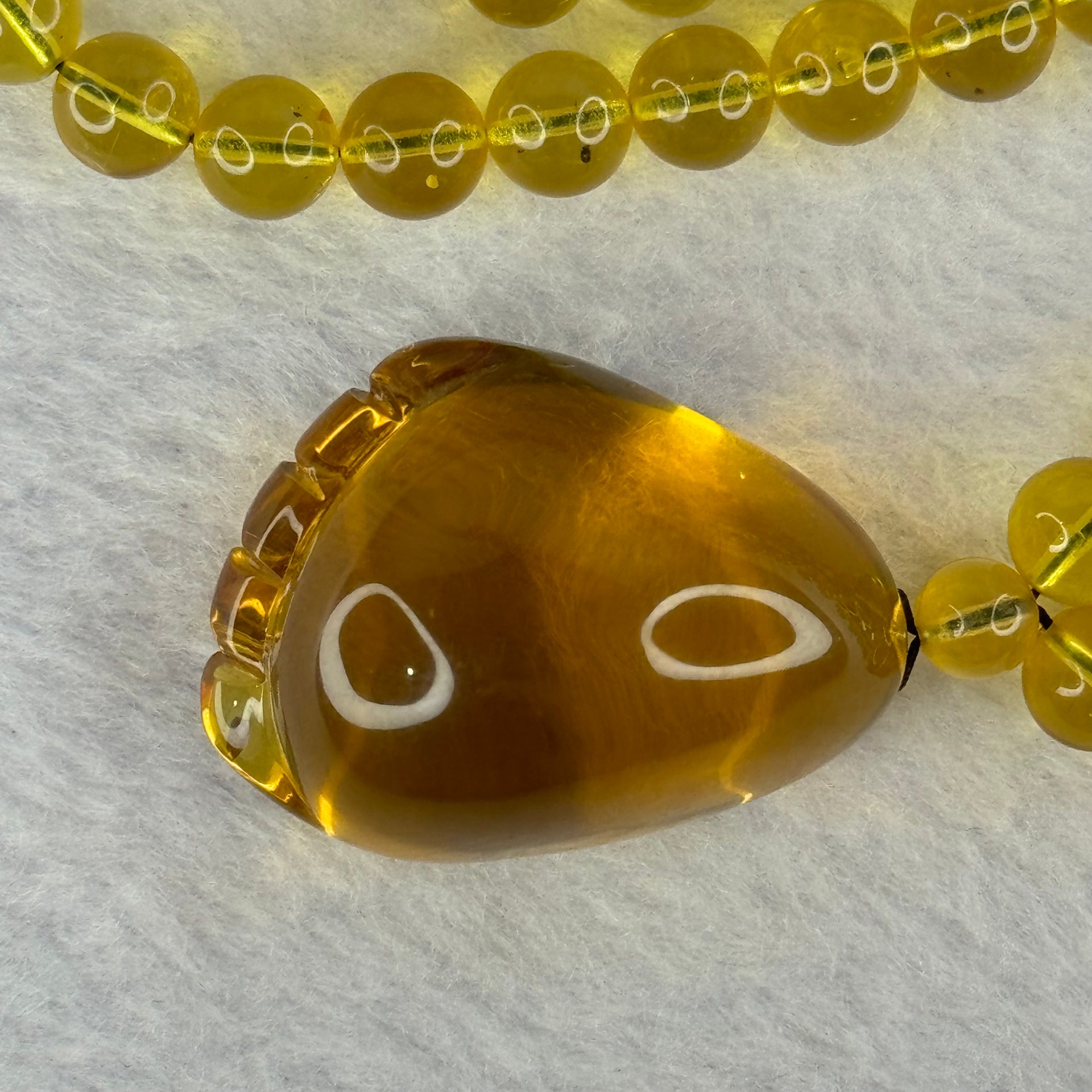 Natural Yellow Amber Foot Pendent 32.5 by 24.2 by 19.5mm with Yellow Amber Beads Necklace 6.9mm 104 Beads Total 22.56g - Huangs Jadeite and Jewelry Pte Ltd