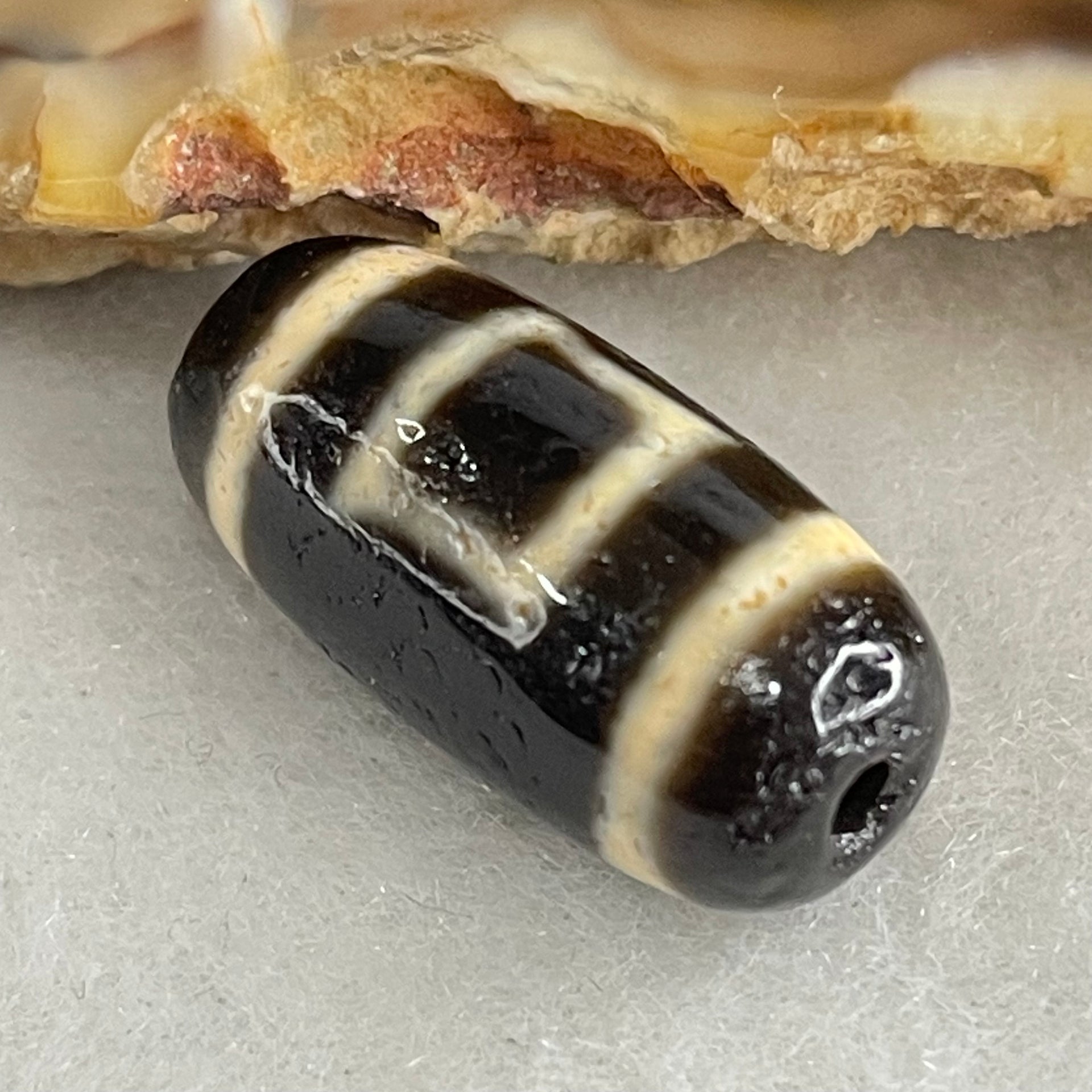 Natural Powerful Tibetan Old Oily Agate Sky Door Serenity 1 Eye Dzi Bead Heavenly Master (Tian Zhu) 一眼天诛 2.68g 19.2 by 9.5mm - Huangs Jadeite and Jewelry Pte Ltd