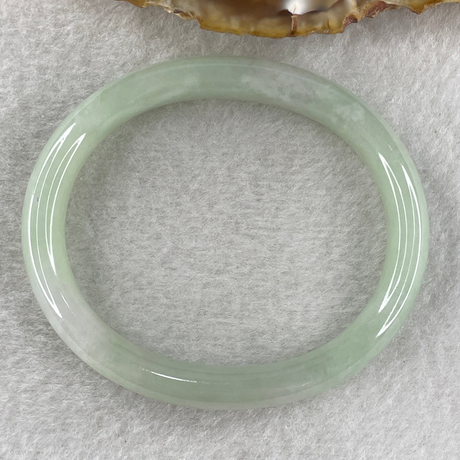 Type A Jelly Full Light Green Jadeite Oval Bangle Internal Diameter 53.7mm 31.30g 9.7 by 7.0mm (Very Very Slight Internal Lines) - Huangs Jadeite and Jewelry Pte Ltd