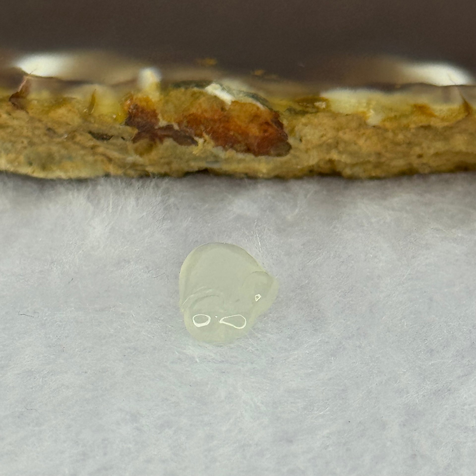 Type A Icy Faint Green Jadeite Rabbit Charm 0.55g 12.1 by 3.4 by 7.8mm - Huangs Jadeite and Jewelry Pte Ltd