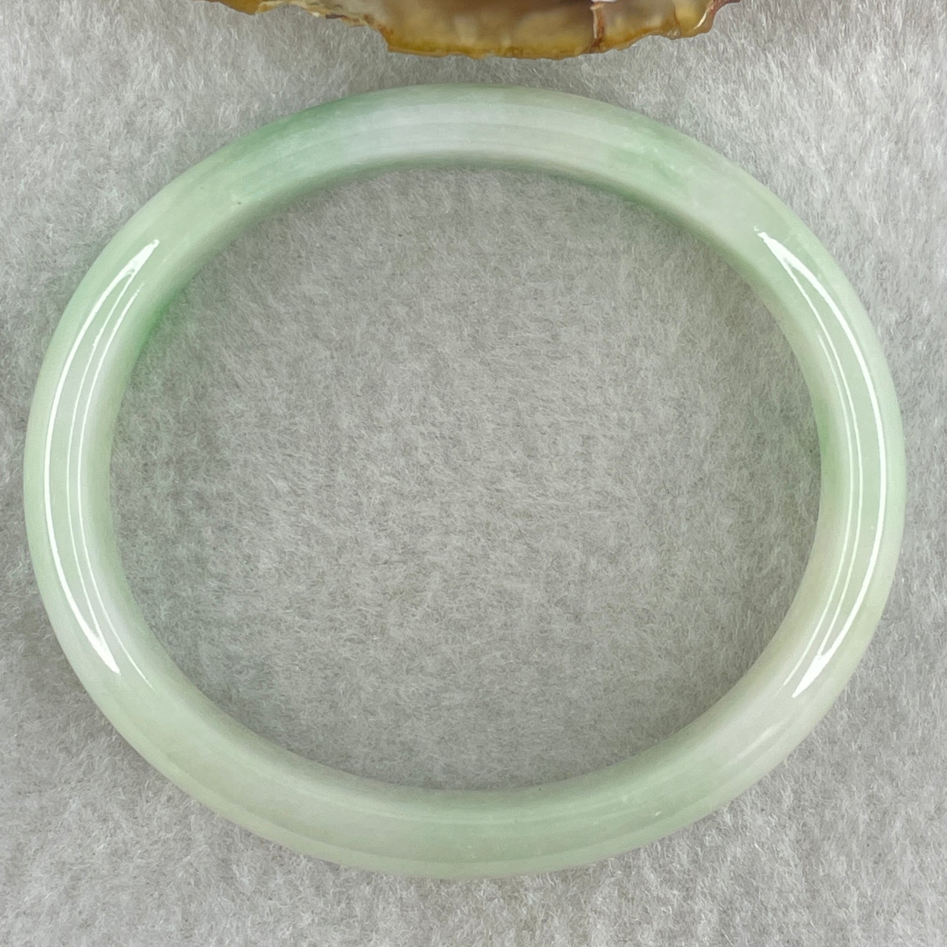 Type A Natural Light Green Faint Lavender with Emerald Green Patches Jadeite Oval Bangle 31.66g Inner Diameter 53.4mm 12.2 by 5.7mm (Internal Lines) - Huangs Jadeite and Jewelry Pte Ltd