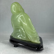 Natural Green Serpentine Siting Milo Buddha with Wealth Pot with Wooden Stand Display 1362.0g 165.0 by 110.0 by 150.0mm - Huangs Jadeite and Jewelry Pte Ltd