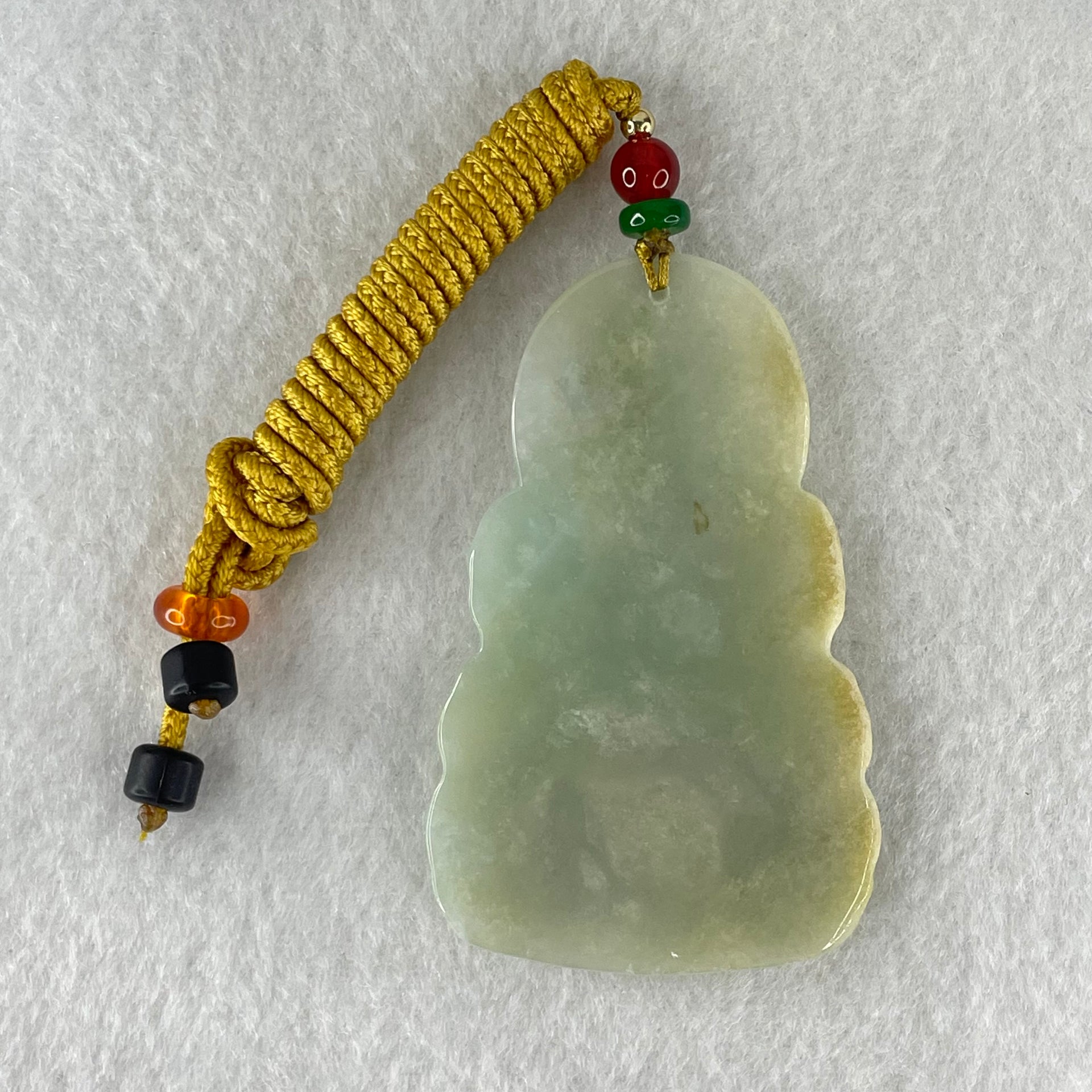 Type A Light Blueish Green with Yellow Jadeite Guan Yin Tara Pendant 29.14g 60.1 by 38.8 by 6.5mm - Huangs Jadeite and Jewelry Pte Ltd
