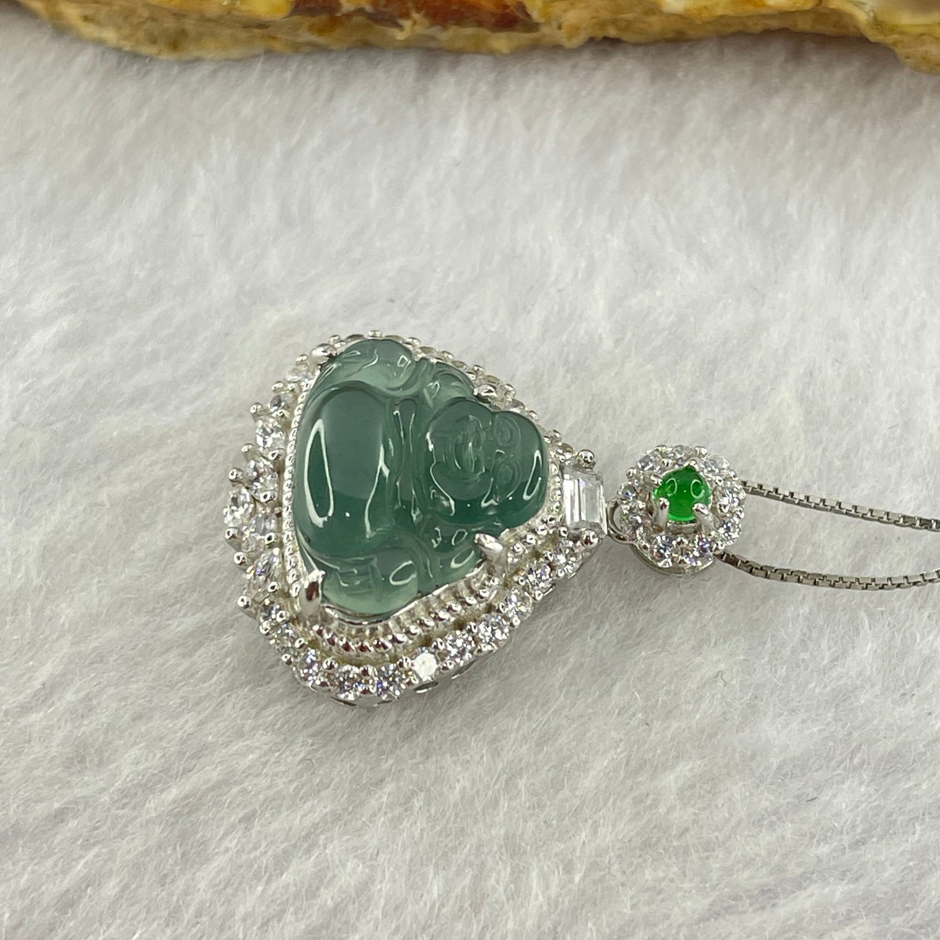 Type A Icy Blueish Green Jadeite Milo Buddha Pendent with Crystals in S925 Sliver Setting and Chain 3.39g 12.8 by 16.0 by 3.0mm - Huangs Jadeite and Jewelry Pte Ltd